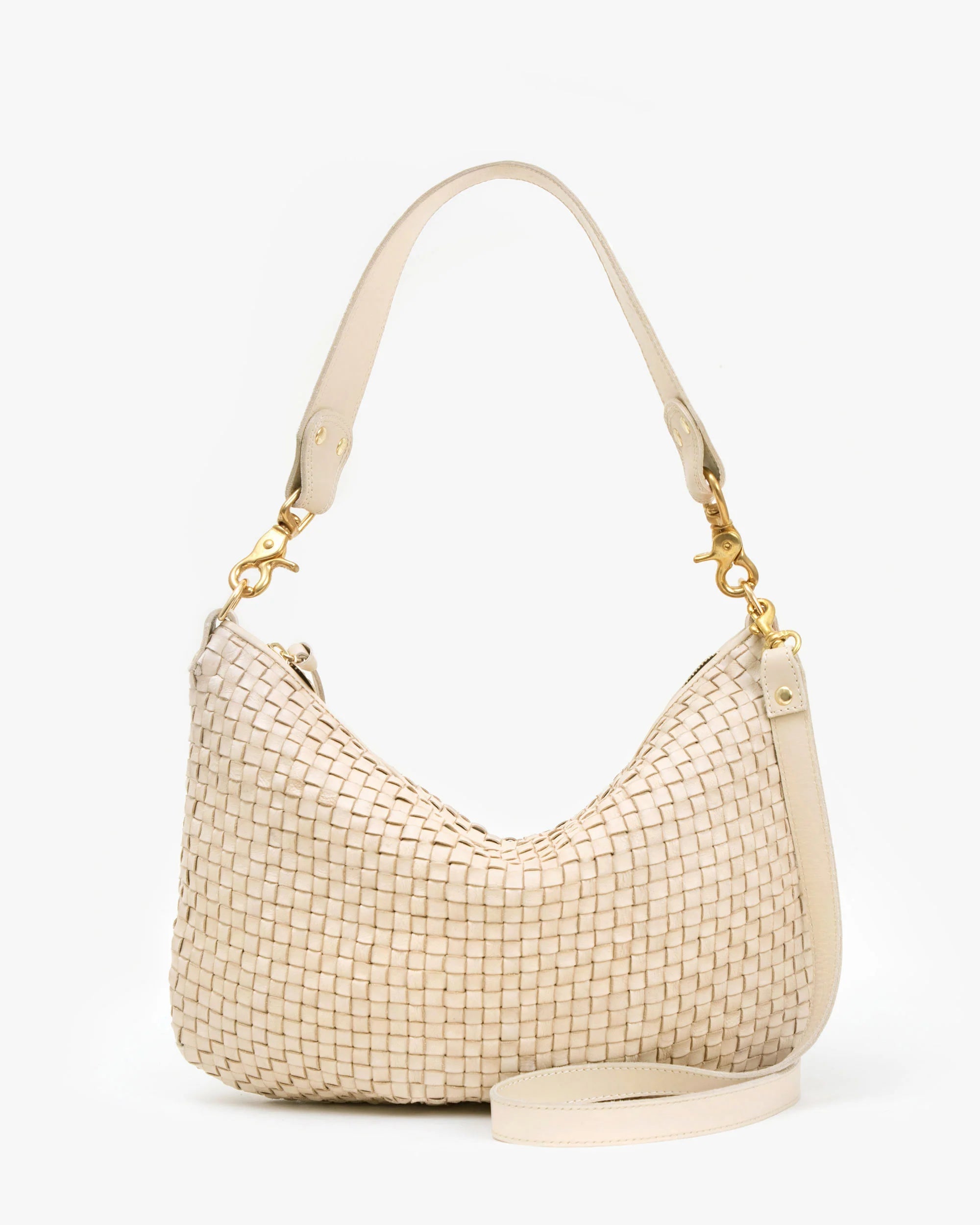 Introducing the Moyen Messenger from Clare Vivier: a beige woven hobo bag crafted from luxurious nappa leather. It features a curved shape and crossbody strap with gold hardware. The zip-top design enhances its sleek silhouette against a plain white background.