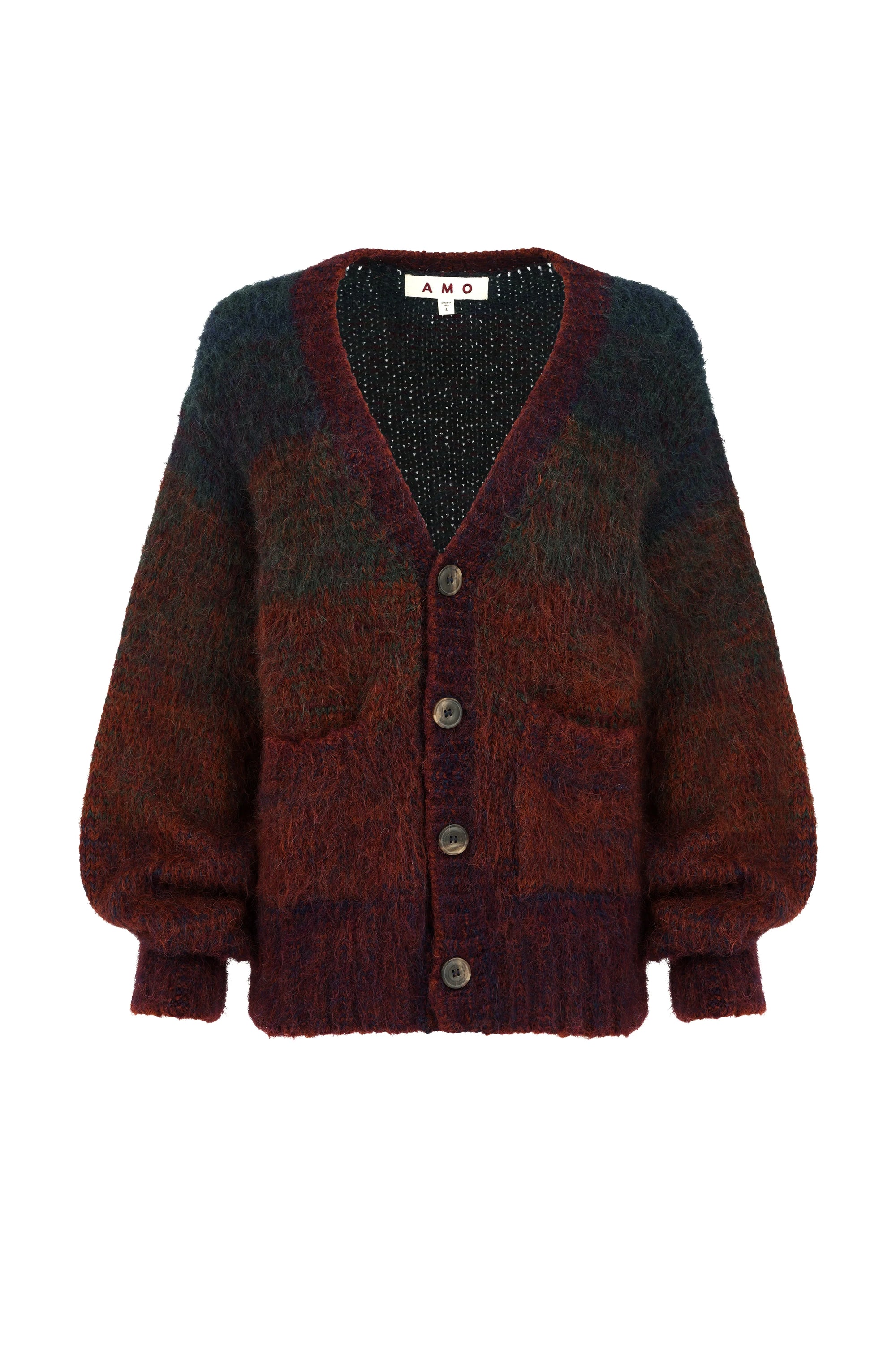 The Nancy Sweater by AMO Denim is a fuzzy, oversized ombré cardigan with a deep V-neck, front buttons, two pockets, and a relaxed fit in dark red, burgundy, and green tones for a cozy, effortless style.