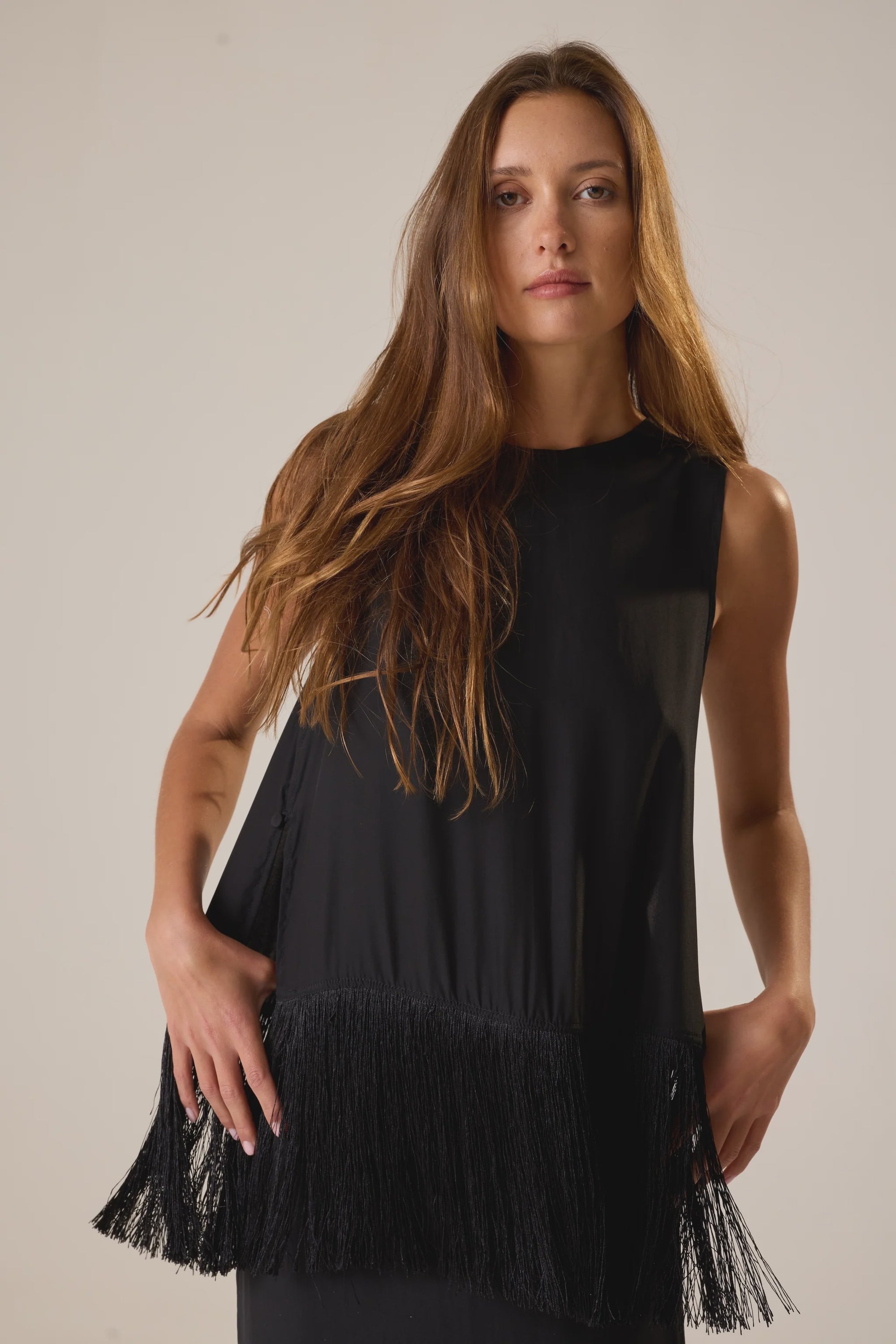 Black Natalie Martin Jessie Top on model, styled with loose hair against a light background for Bungalow Furniture.