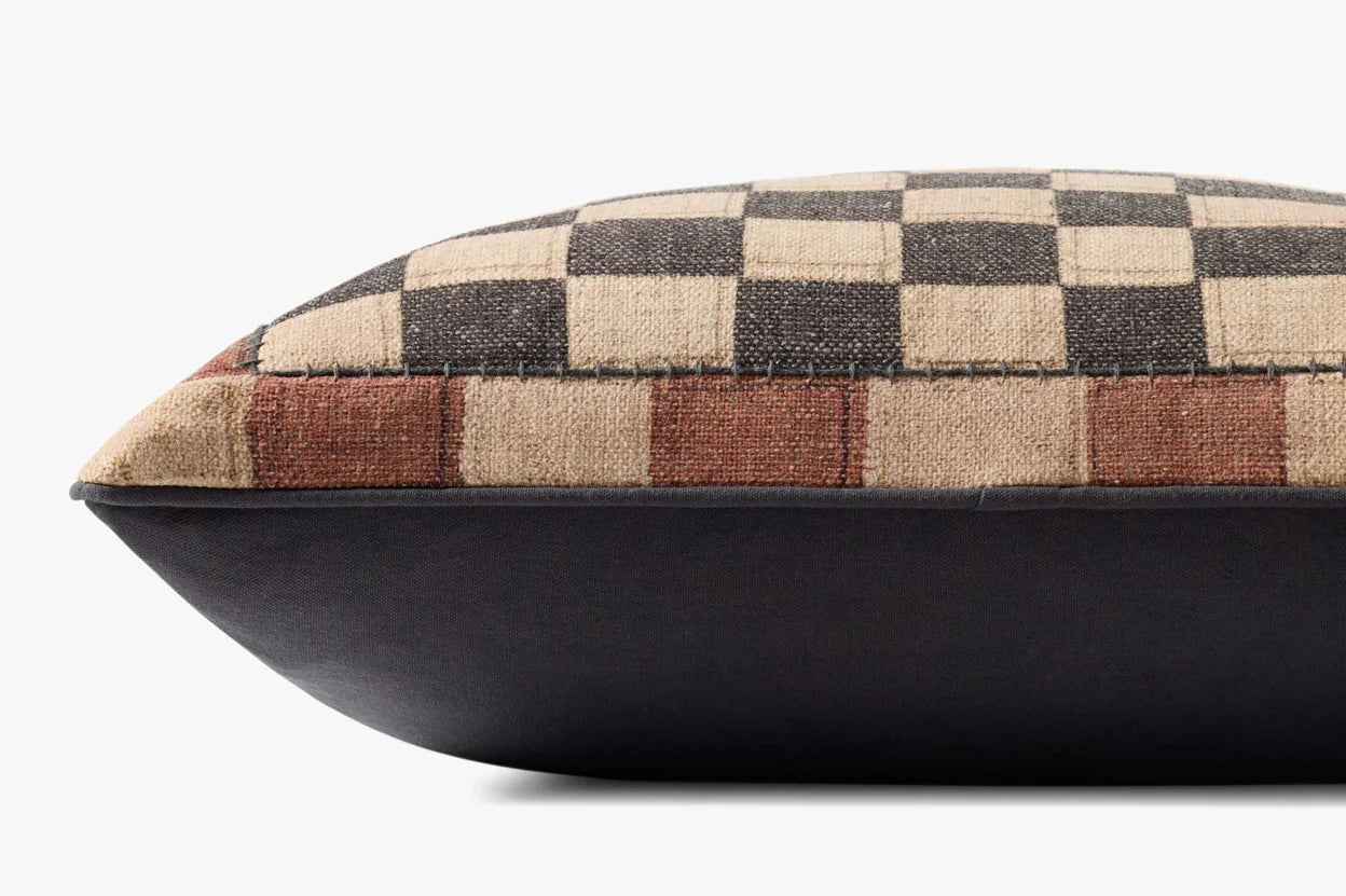The PLL0180 Muliti Pillow 20x20 by Loloi Rugs features a checkered beige, brown, and black design on top with solid dark polyester sides, shown side view on a white background. Includes a hidden flap zipper for easy care.