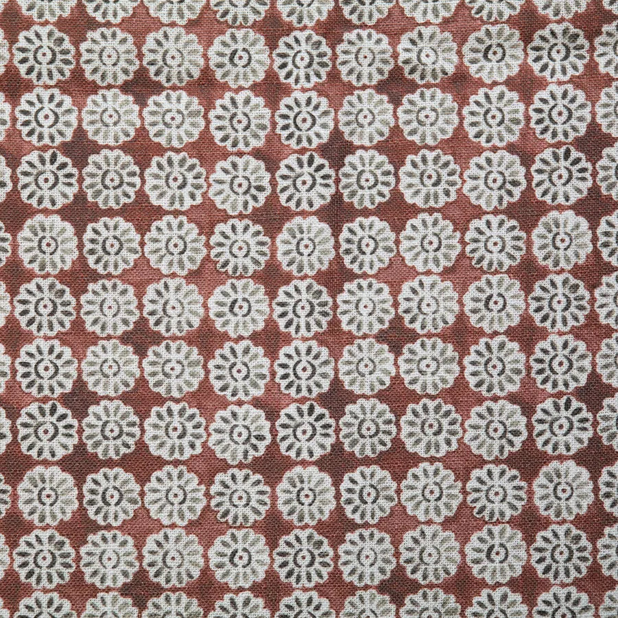 The Pindler Custom 4 Pillow 28x28 showcases a grid of white floral motifs on a reddish-brown background—an exclusive, ultra-luxurious design ideal for euro pillows or accent pieces.