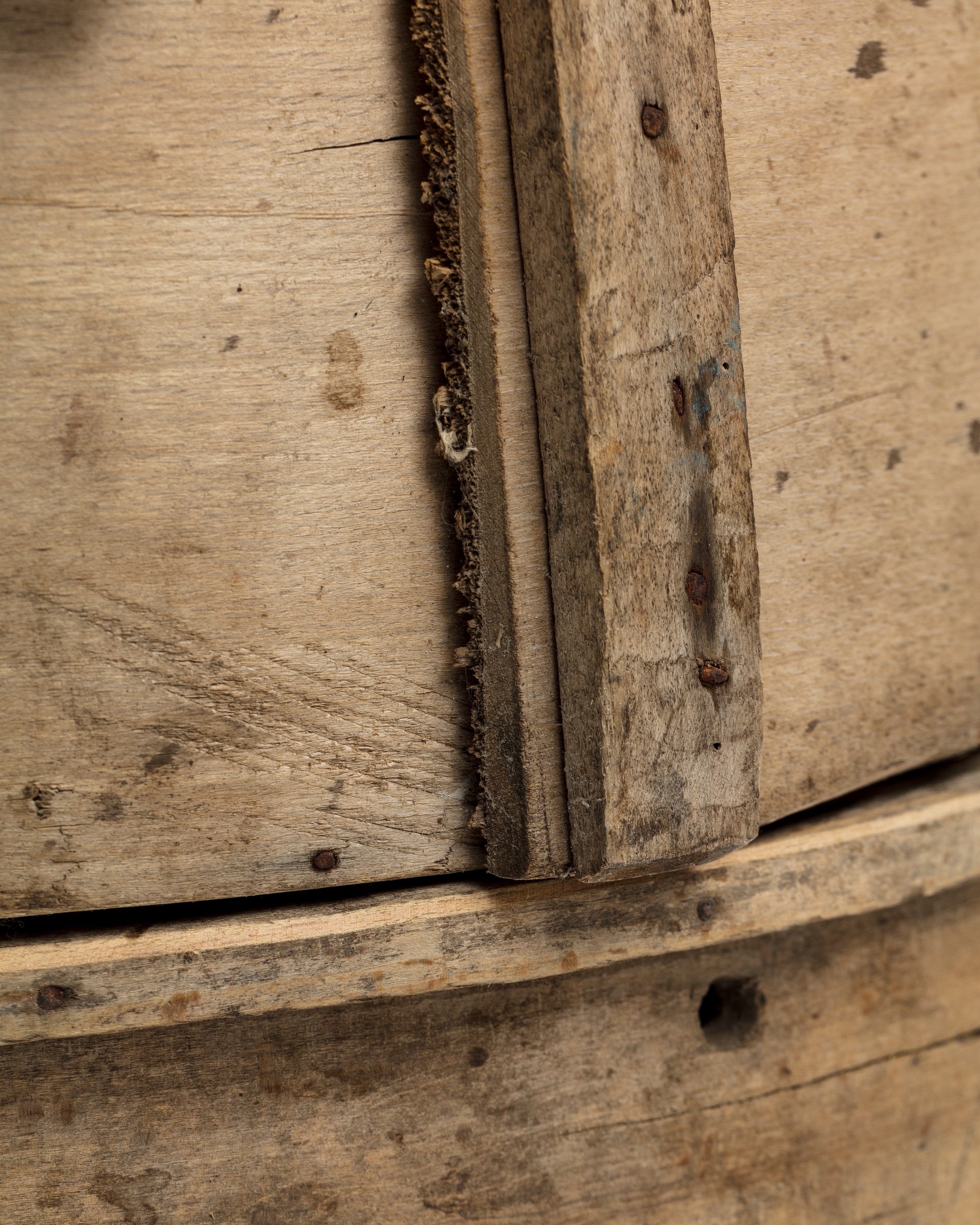 Close-up of a vintage Indus Design Imports CHEESE MOLD BUCKET 35 in Scottsdale, Arizona, with visible textures and aging, showcasing details of the wood grain and metal rivets.