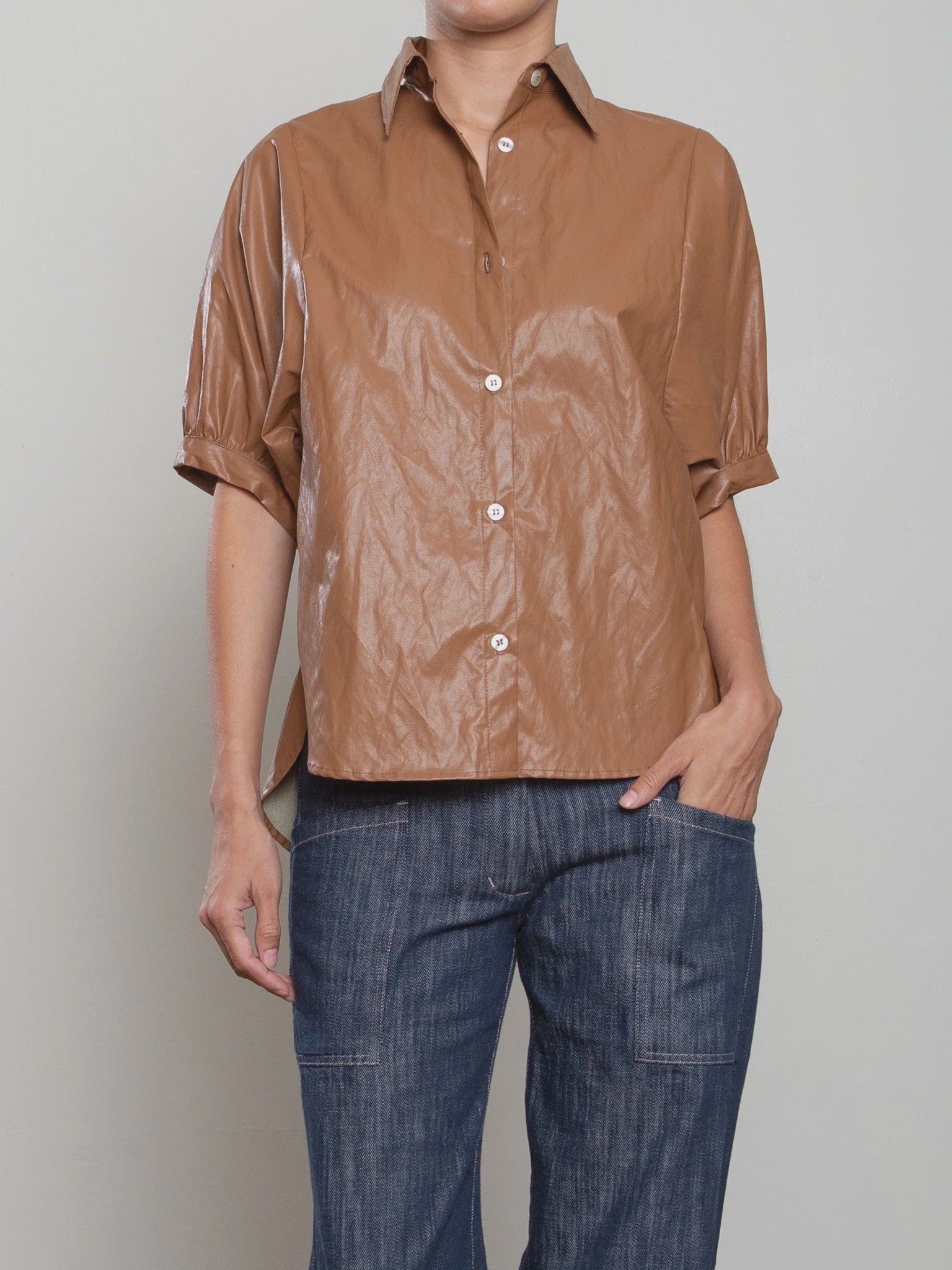 Brown Pharaoh Claude Shirt with rolled sleeves styled with blue jeans, Bungalow Furniture &amp; Accessories.
