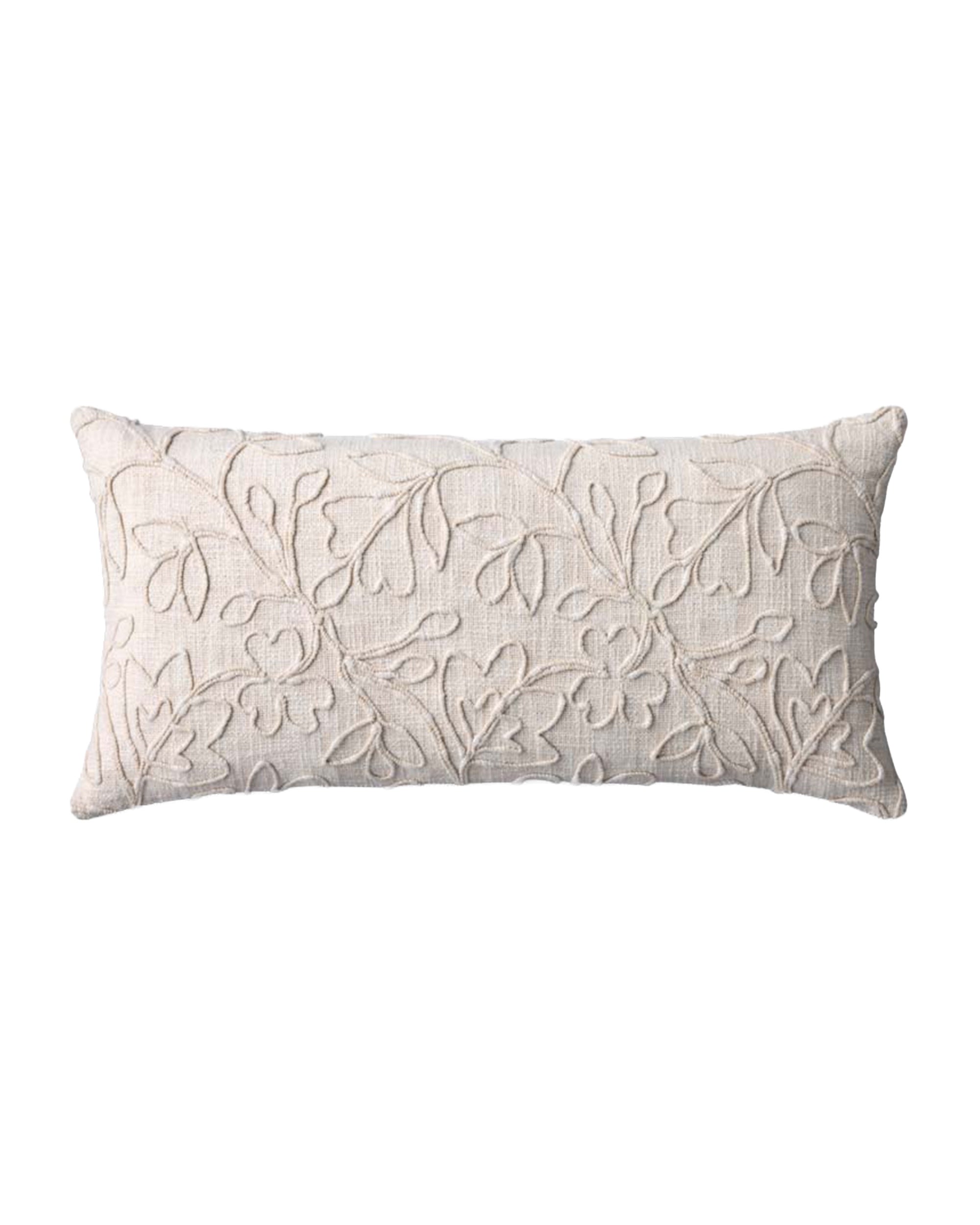 The Loloi Rugs Natural Embroidered 12x27 pillow features a light beige cotton cover with a machine-embroidered floral vine pattern in slightly darker thread for subtle, elegant texture.