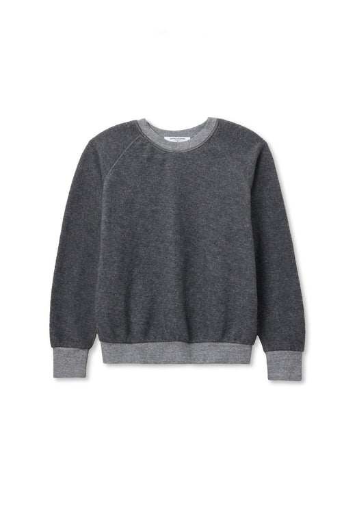 The Perfectwhitetee Ziggy Reverse LS Sweatshirt is a dark gray cotton fleece crewneck with lighter gray ribbed cuffs, collar, and waistband, shown on a white background.