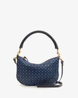 Introducing the Clare Vivier "Petite Moyen S24," a chic mini messenger handbag adorned with a blue and black checkered pattern and elegantly finished with a curved black handle. It boasts gold-tone hardware, handwoven leather accents, and detachable crossbody straps, all beautifully presented against a plain white background.