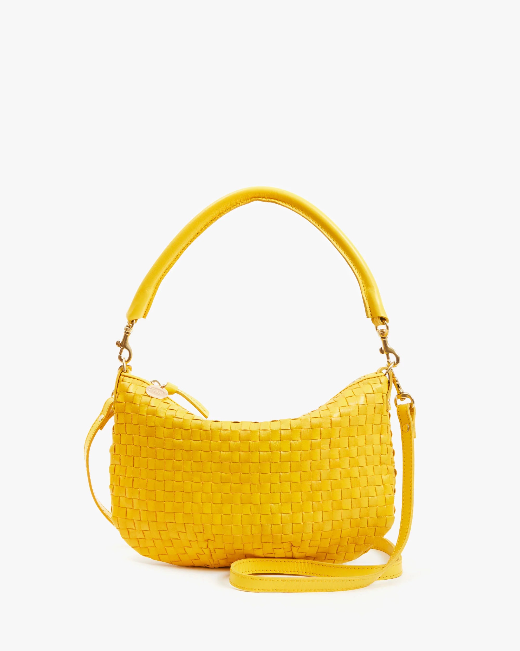The Clare Vivier Petit Moyen Messenger S25 is a small yellow handwoven leather handbag featuring a curved top handle and detachable crossbody straps, shown against a plain white background.