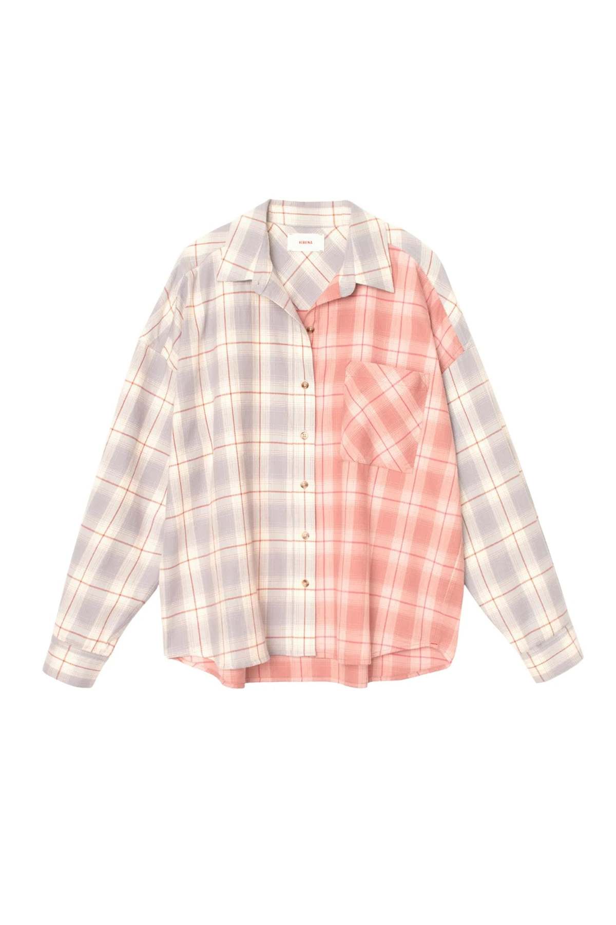 The Phillipa Shirt by Xirena is a collared, long-sleeved button-up made in Los Angeles. It features plaid color blocks—pastel purple on the left, light pink on the right—and a matching pink chest pocket.