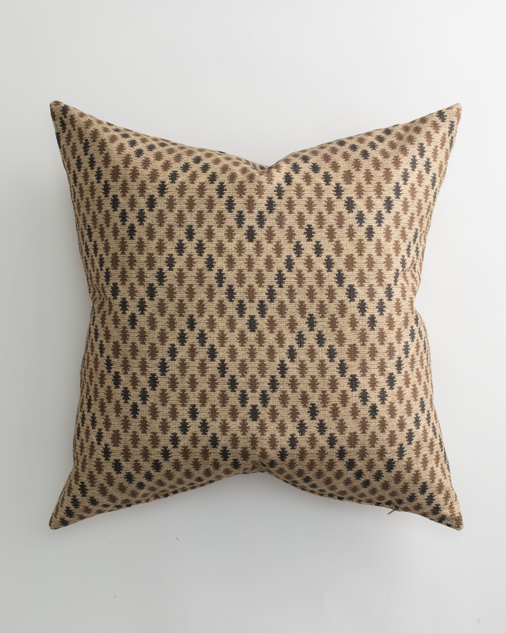 The Pindler ETOSHA 26x26 Pillow features a brown, beige, and black geometric diamond pattern and includes a plush down feather insert. Shown from above on a plain white background.