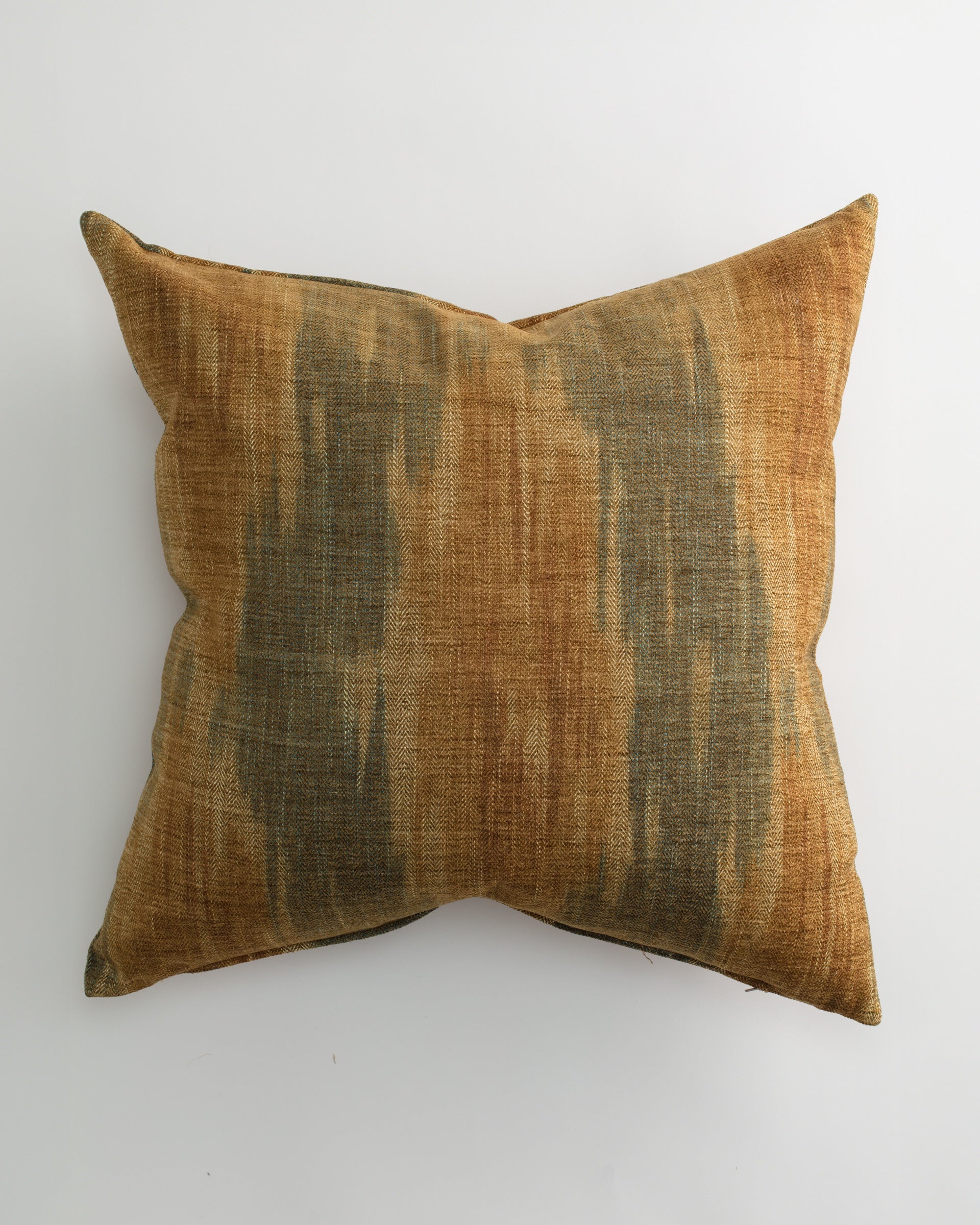 The RANDERS 26x26 Pillow by Pindler features luxurious, textured woven fabric in brown, gold, and muted green tones, shown on a plain white background.