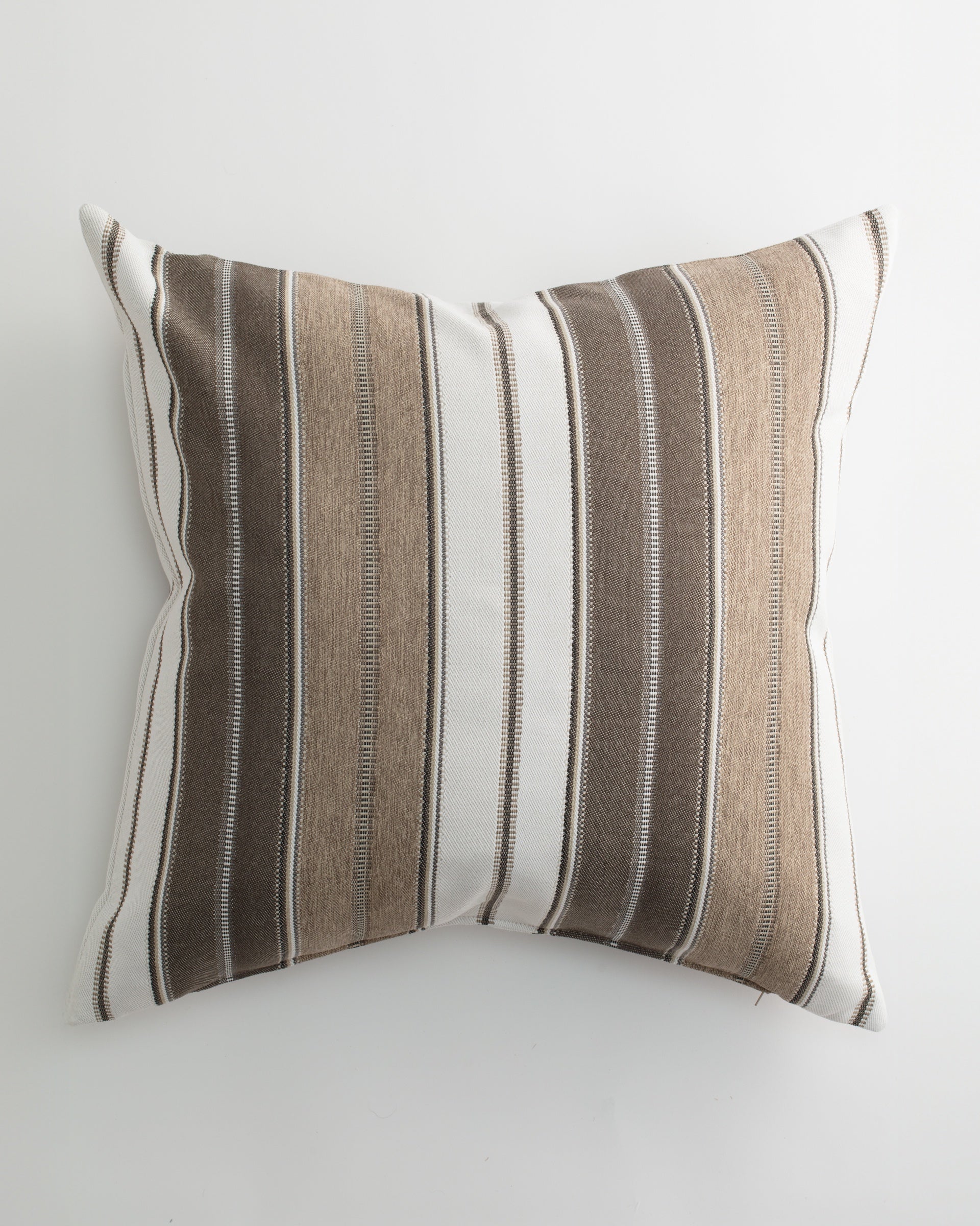 The EVEREST 26x26 Pillow by Pindler adds a modern touch with vertical brown, beige, and white stripes of varying widths on a crisp background, offering both style and comfort with its down insert.