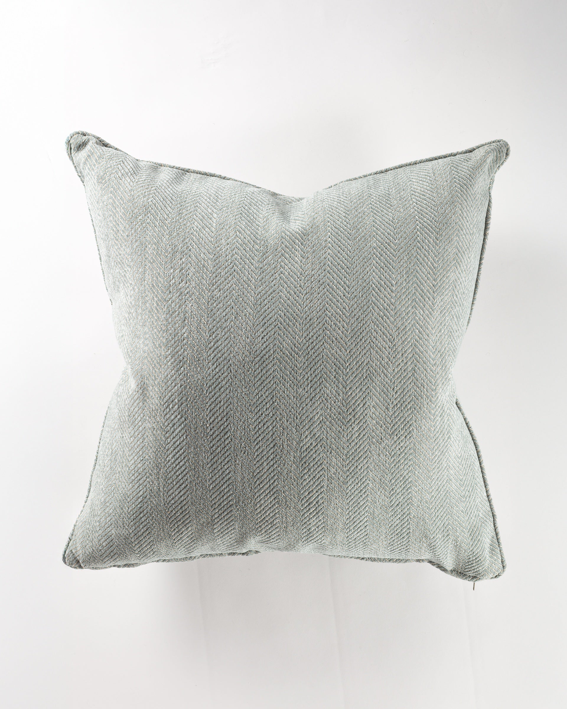 The Gabby Horme/Mineral Gr-2 Pillow 26x26 features a square, light gray textured design with a subtle herringbone pattern, adding sophisticated style. Photographed against a plain white background.