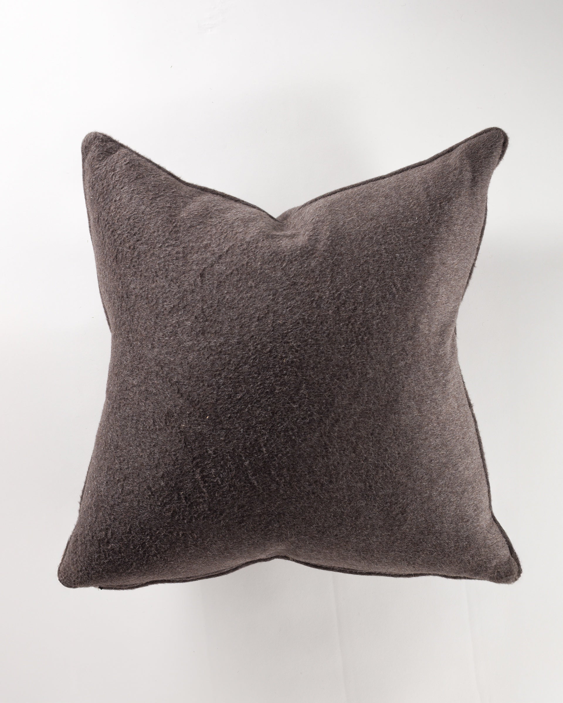 The Gabby Paca Bark Gr-10 Pillow 26x26 in dark gray with a textured finish is shown from above on a plain white background.