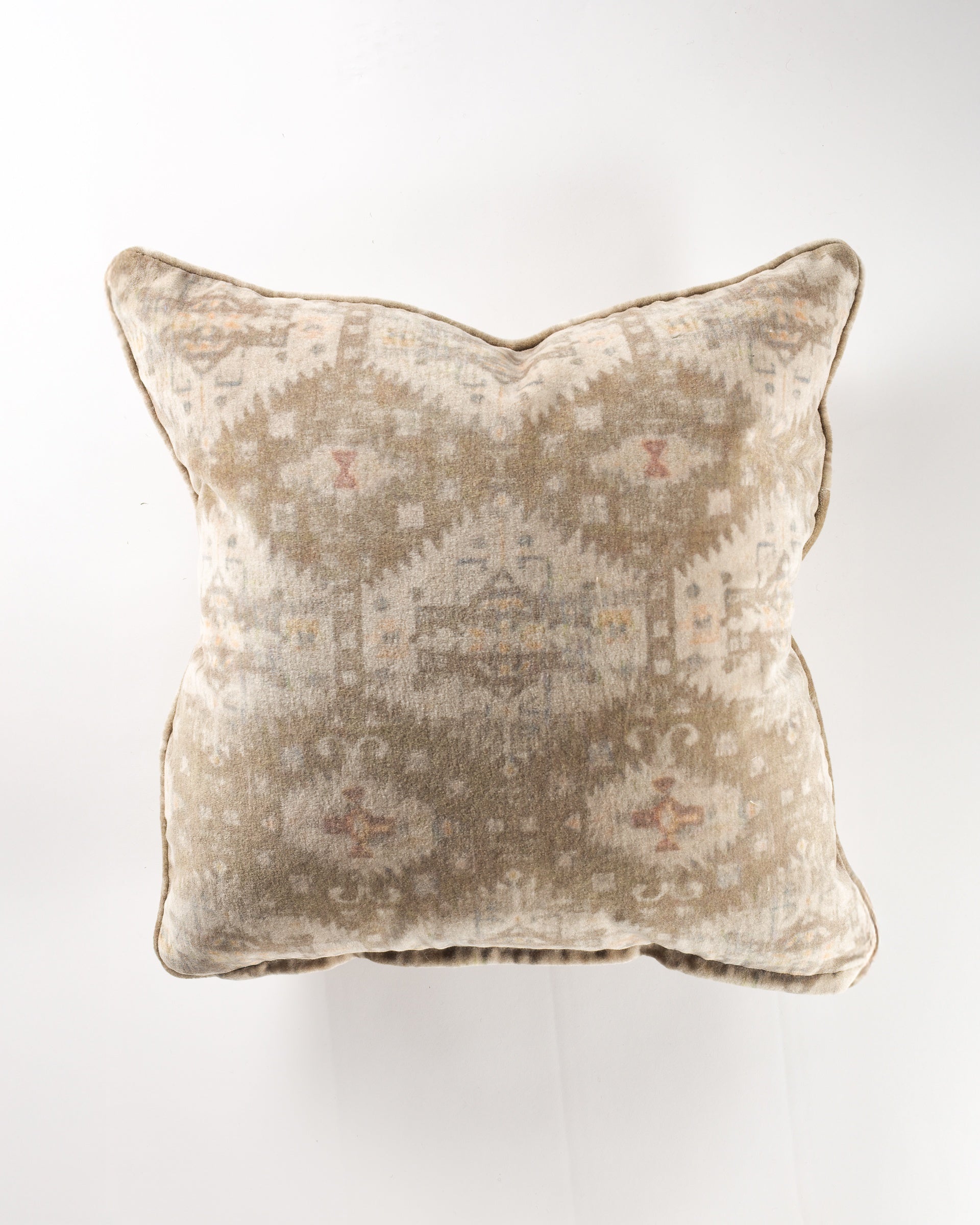 The Gabby Afluent Chocolate Gr-10 Pillow 26x26 features a square, beige design with a faded geometric and tribal-inspired pattern—ideal for elevating your luxurious pillow collection.