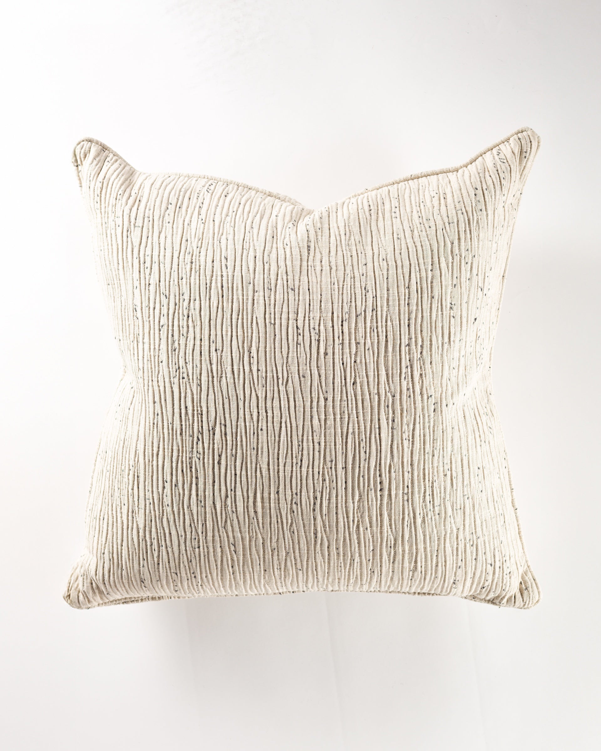 The Gabby Paxton Linen Gr-5 Pillow 26x26 features textured off-white fabric with vertical stitched lines, offering an elegant touch to your euro pillows collection.