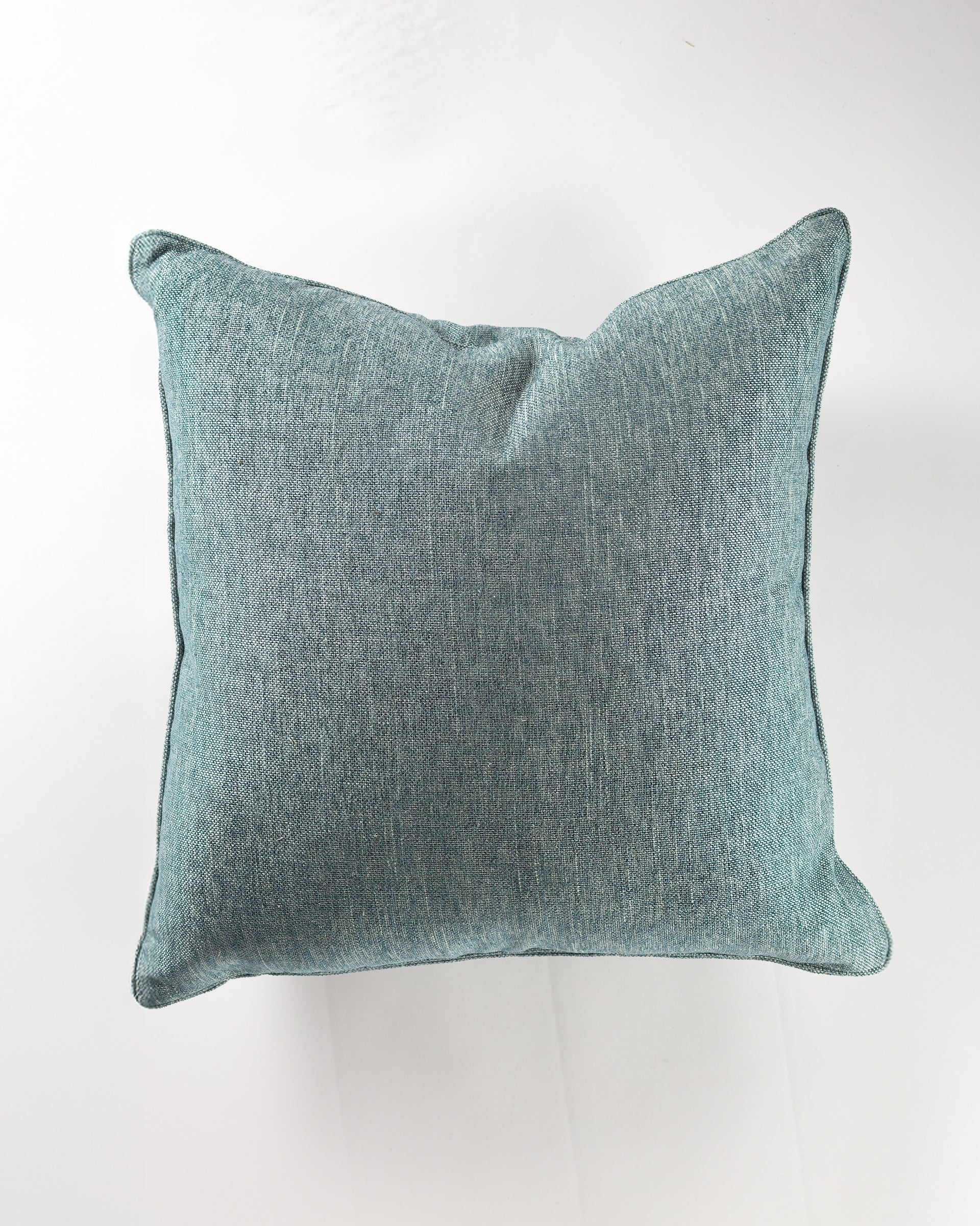 The Gabby Sky North Sea Gr-3 Pillow 26x26 is a square, light blue-green euro pillow with subtle texture and a plush insert, shown from above on a white background—ideal for adding a touch of luxury to your space.