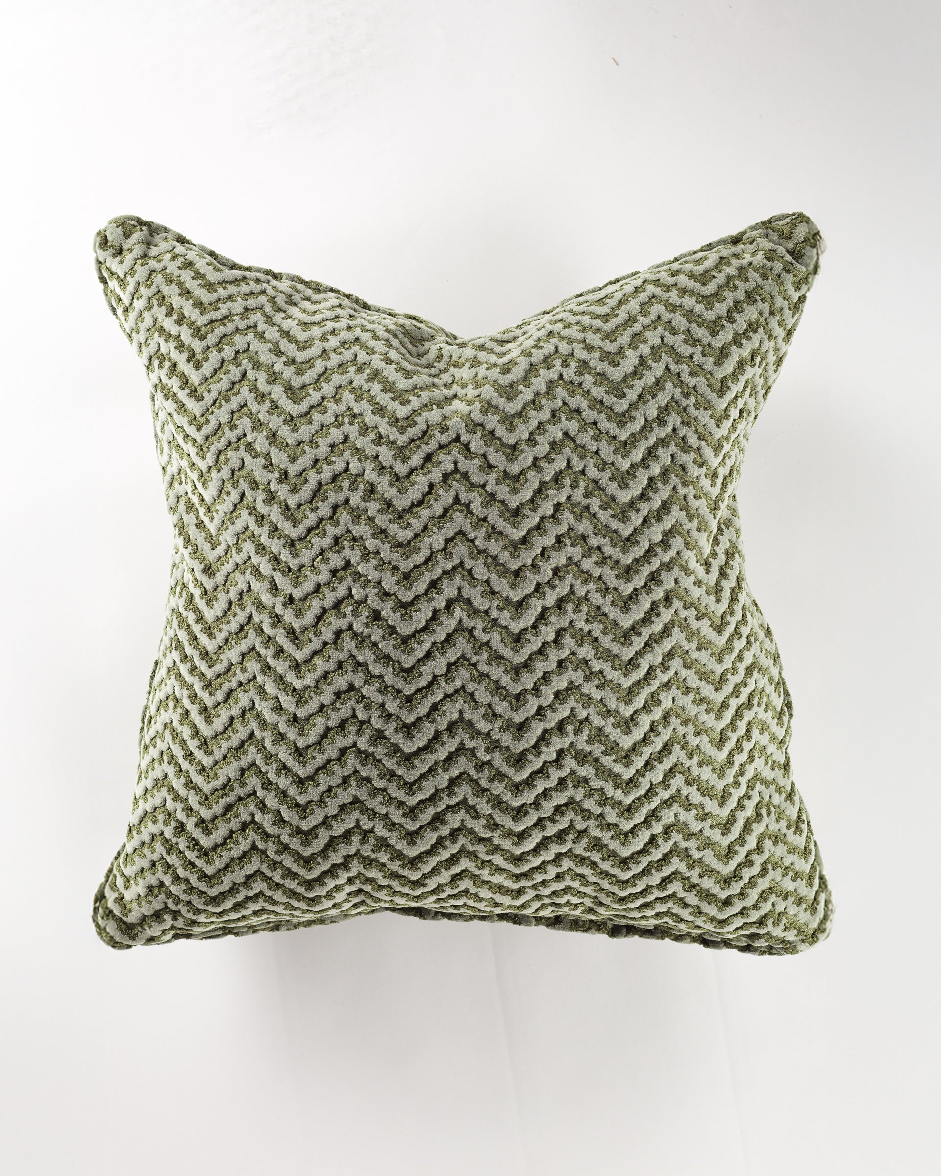 The Gabby Clara Forest Gr-7 Pillow 26x26 is a square green euro pillow with a textured chevron pattern, shown from above on a white background—ideal for bringing luxurious style to any space.
