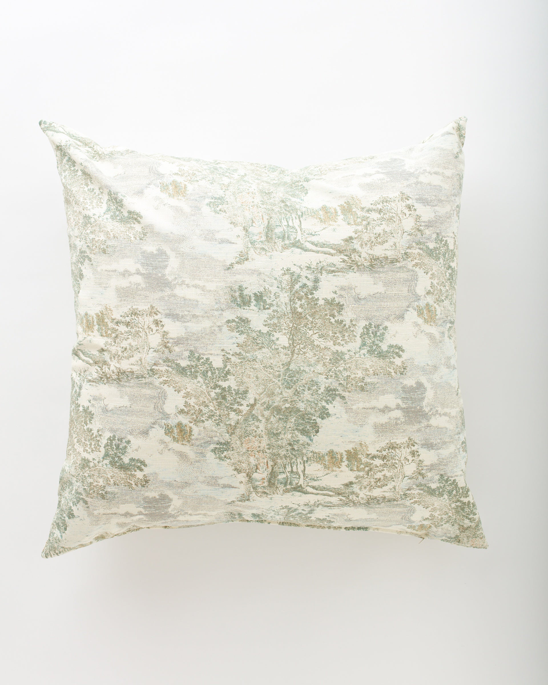 The Pindler Tabitha 26x26 is a square pillow featuring a subtle, vintage-inspired pastoral landscape print in muted green, beige, and gray on a light background; fits most euro pillows or your favorite insert.