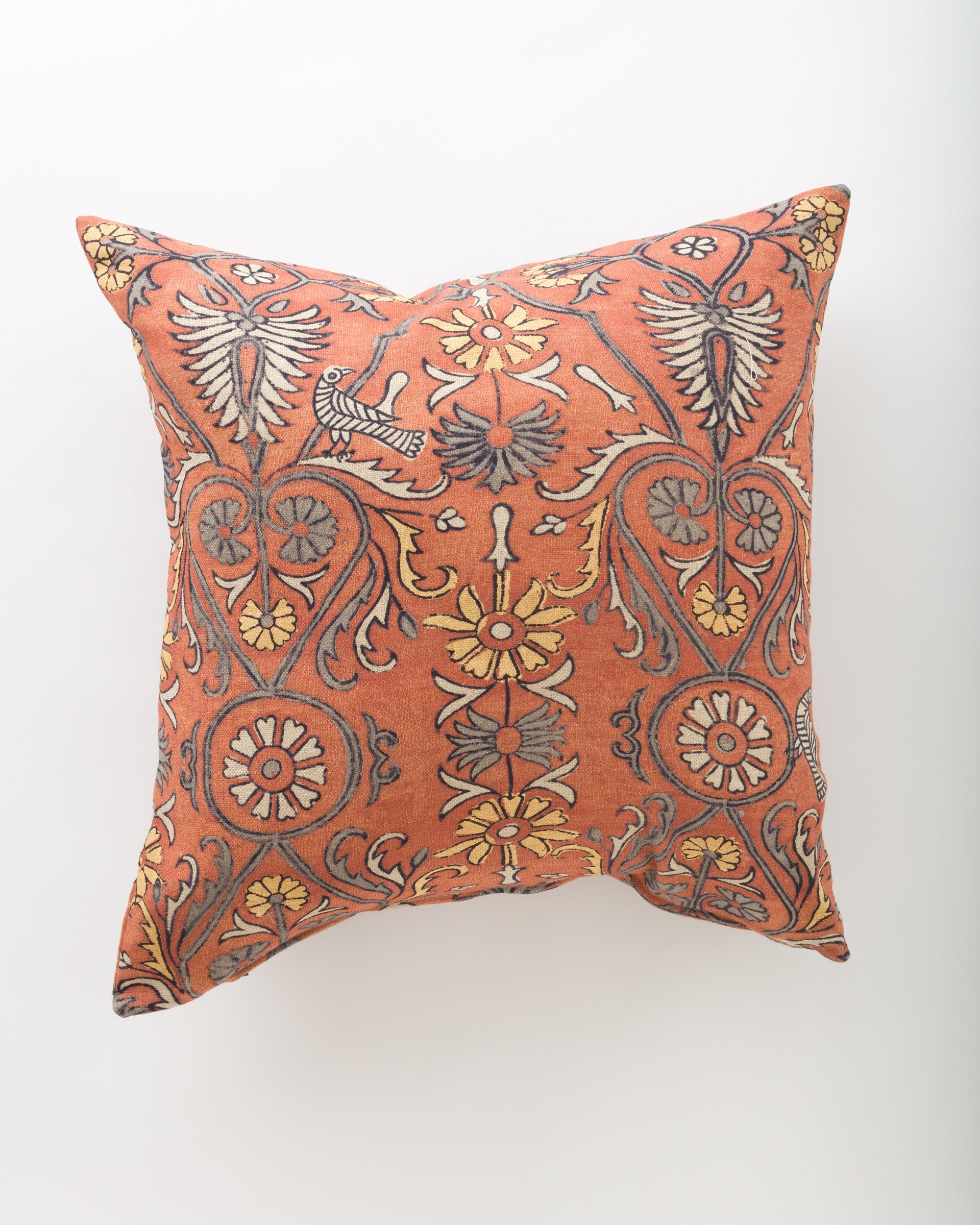 The Amika 26x26 pillow by Pindler features an intricate orange, yellow, and gray floral and geometric pattern on a light background with hearts, flowers, and symmetrical shapes—ideal to pair with your favorite insert for added comfort.