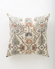 The Amika 26x26 pillow by Pindler features an ornate floral and leafy pattern in muted orange, gray, and beige on a cream background—perfect for pairing with euro pillows to create a coordinated, luxe look.