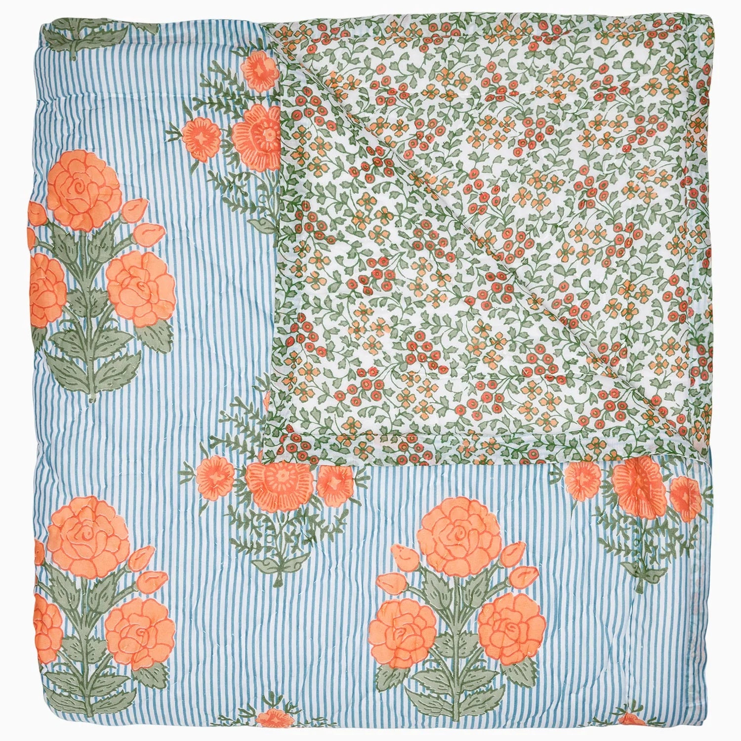 The Bipin Tangerine Quilt by John Robshaw is a hand-quilted cotton voile throw, showcasing large orange flowers and green leaves on blue and white stripes, with a reverse of small red and yellow blossoms on white.