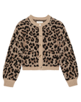 The Windsor Cardigan by The Great Inc. is a fuzzy, long-sleeve cropped cardigan in brown and black leopard jacquard, crafted from a soft alpaca blend with a round neckline, button-down front, and ribbed cuffs and hem.
