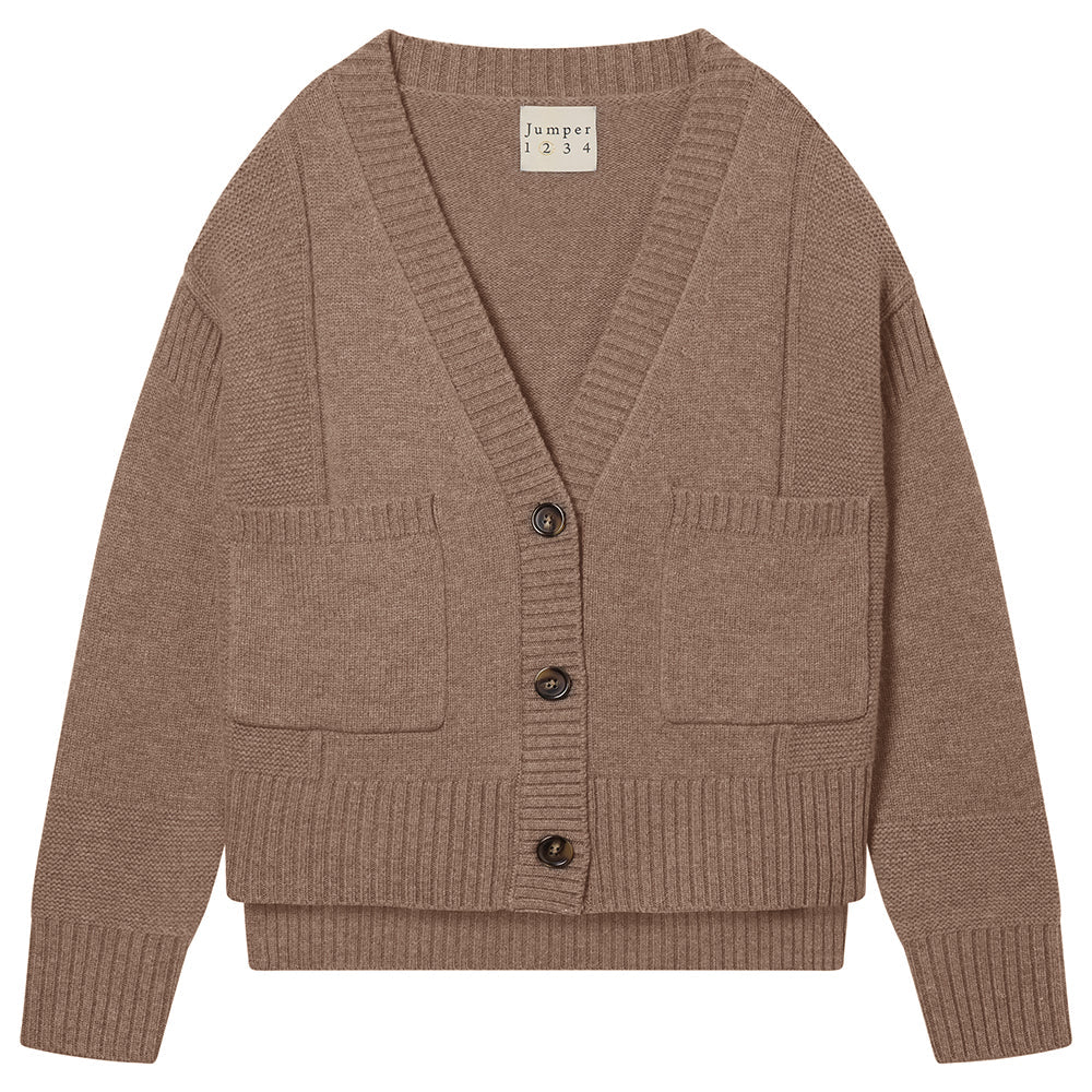 The Guernsey Cardigan by Jumper 1 2 3 4/CR2 in fawn grey is a soft Merino Cashmere V-neck with three front buttons, ribbed cuffs and hem, and two patch pockets.