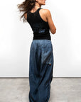 Free City Matte Satin Loose Drawcord Biggy Pant in Moonshrooms styled with a black tank top and white sneakers.