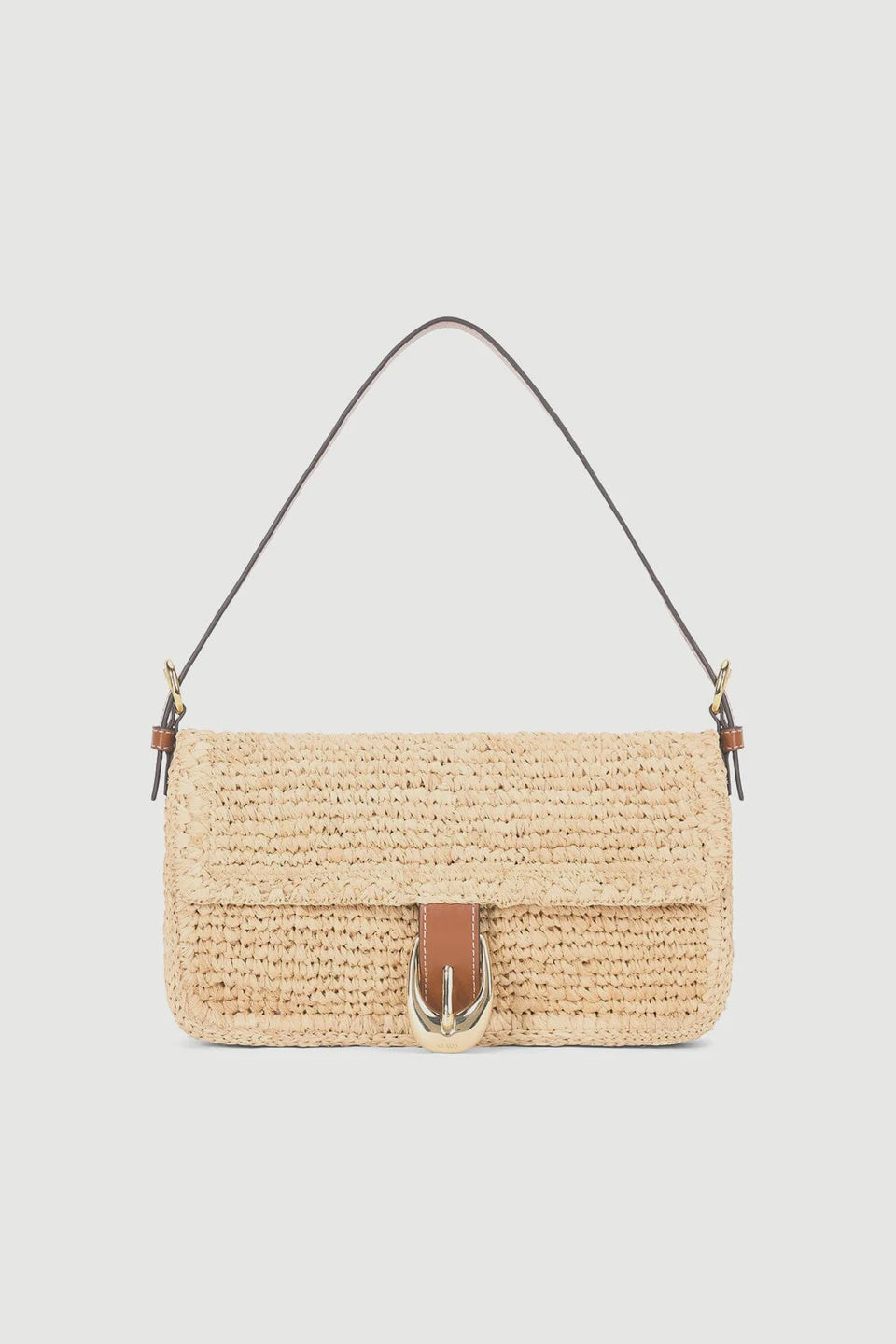 The Staud Harlow Raffia Bag in Natural features a rectangular woven design, a brown leather strap, and a gold moon buckle clasp on the front, shown against a plain white background.