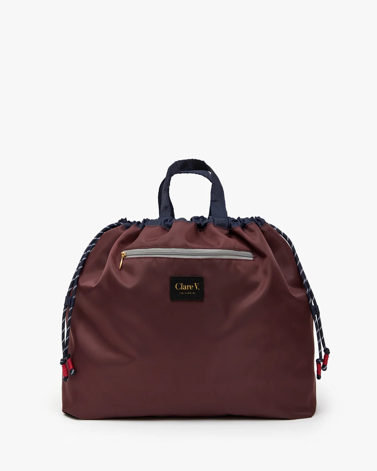 Clare Vivier Sac Tout Navy tote with black handles, front zipper, and drawstring sides on white background.