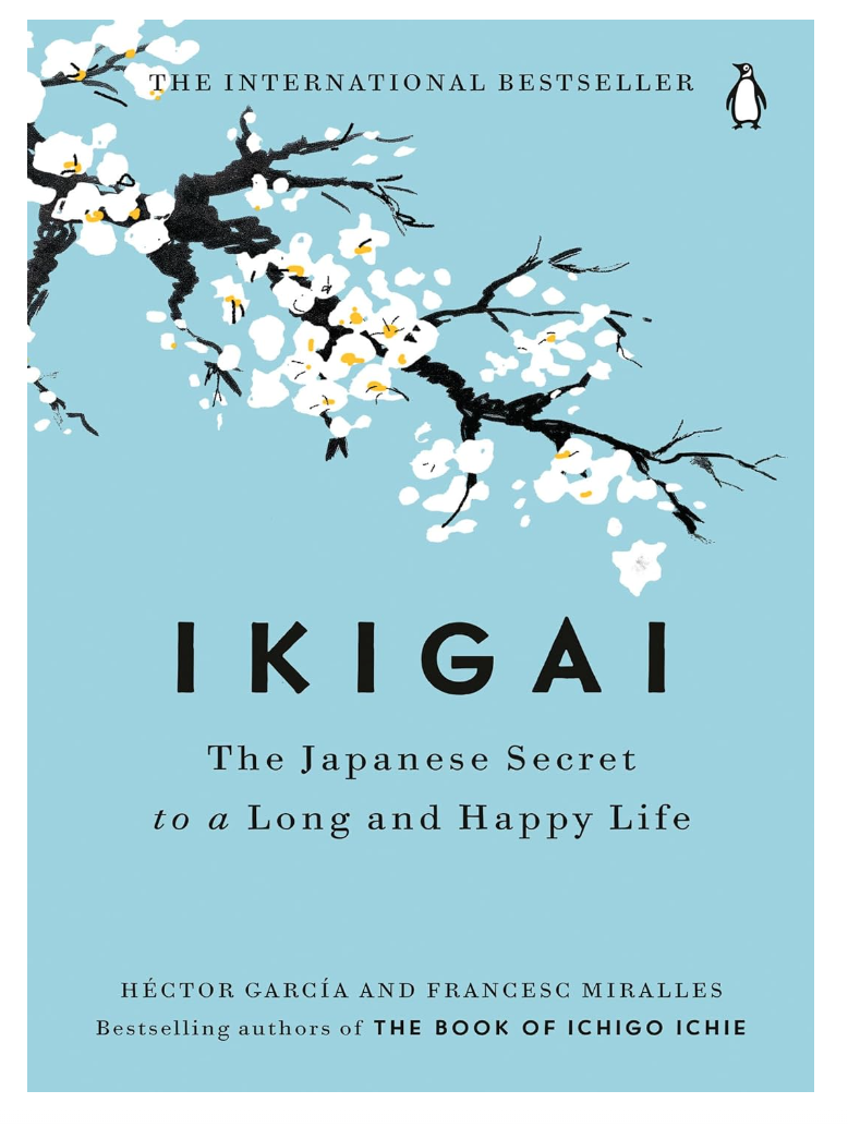 Book cover of "Ikigai" by Random House featuring a floral branch illustration in the Bungalow style on a pale blue background with white and orange text.