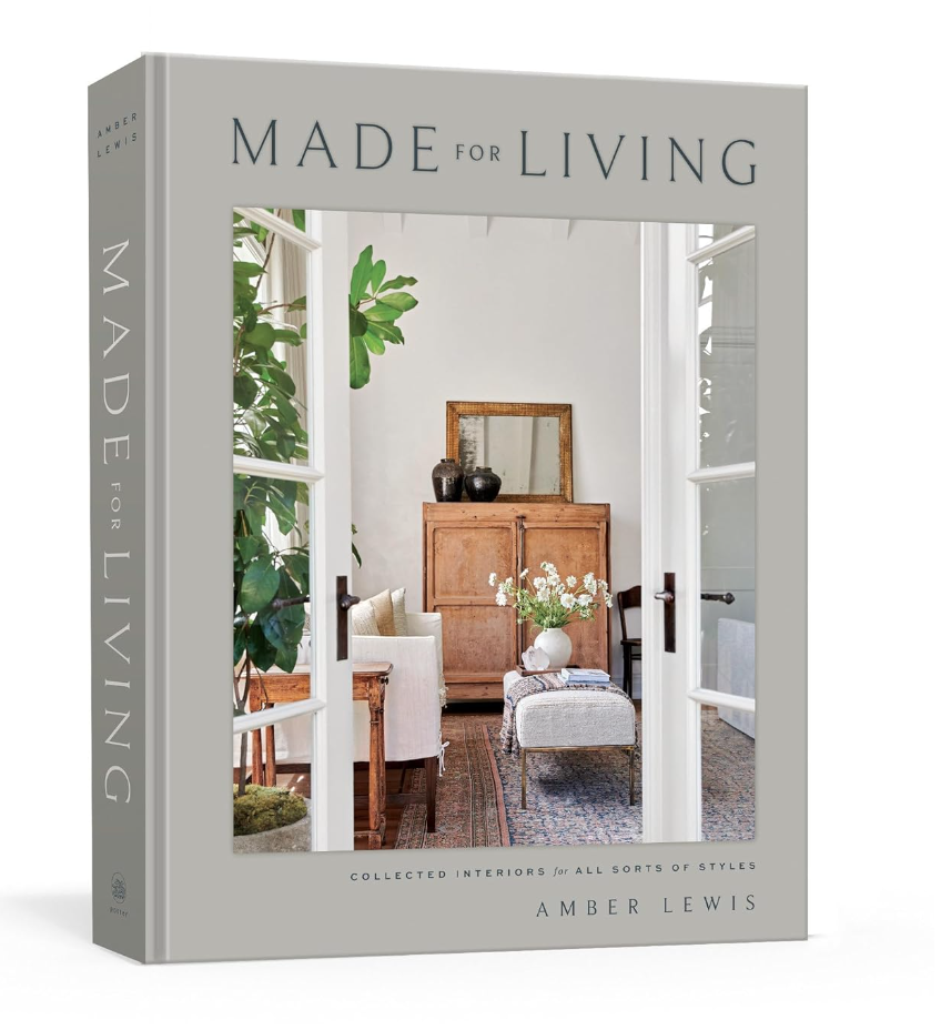Book cover of "Made for Living" by Amber Lewis published by Random House featuring an inviting room with rustic wooden furniture, plants, and neutral tones in Bungalow style.