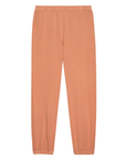 Introducing The Stadium Sweatpant by The Great Inc., a pair of peach-colored sweatpants with an elastic waistband and elastic cuffs at the ankles. These vintage athletic wear-inspired pants have a simple, casual design with no visible logos or pockets.