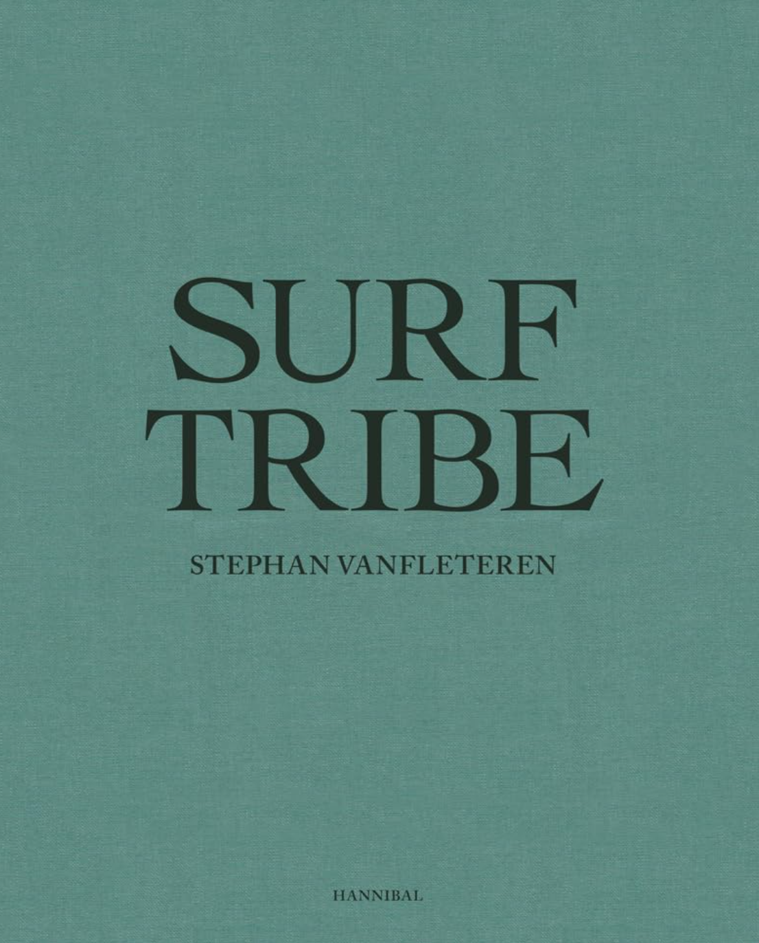 The cover of a book titled "Surf Tribe" by Stephan Vanfleteren reflects the essence of surf culture. The text is centered and presented in bold, uppercase black letters against a flat turquoise background. The brand name, "National Book Network," appears at the bottom in smaller type.