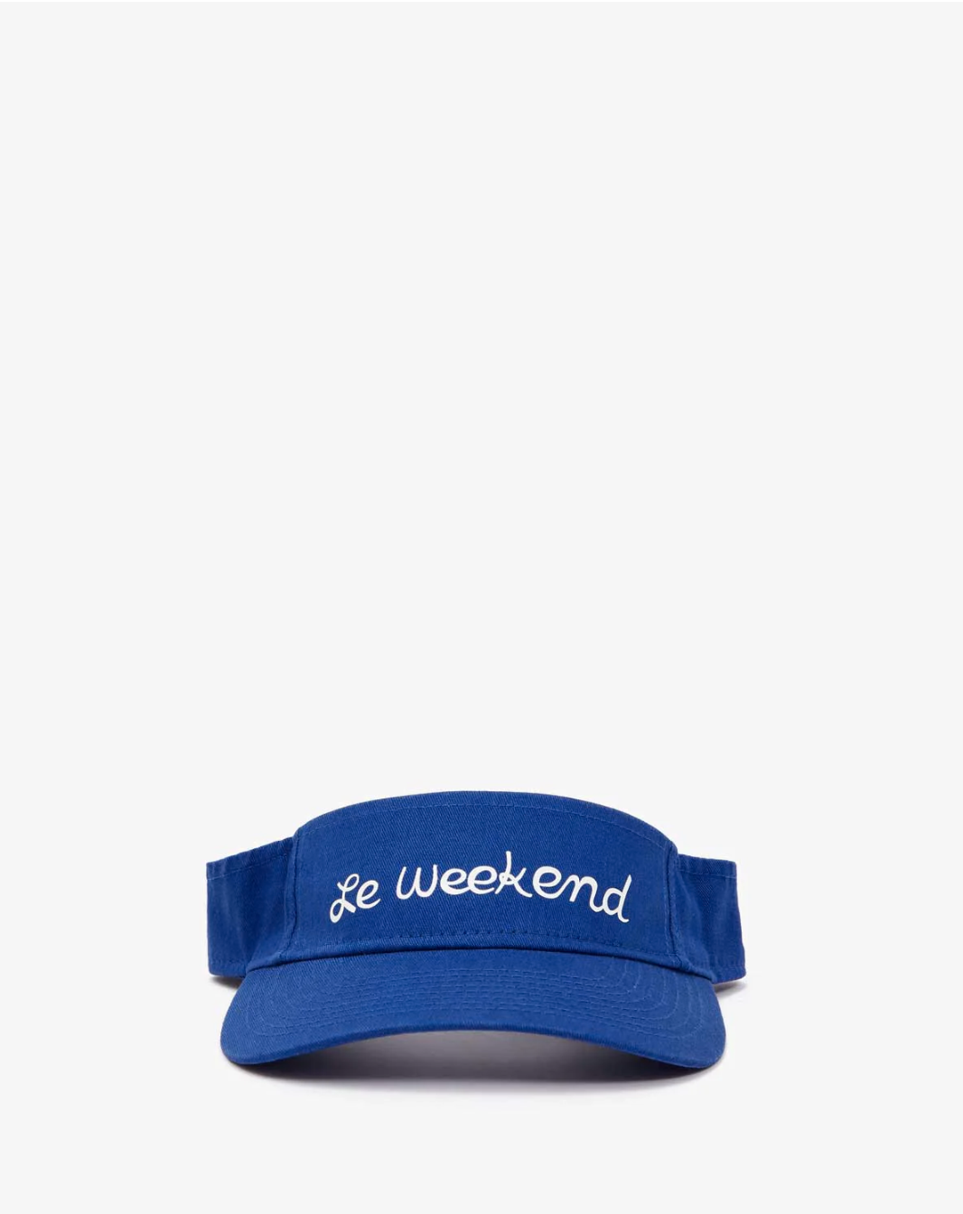 A royal blue, 100% cotton Clare Vivier Visor with the phrase &quot;Le weekend&quot; embroidered in white on the front. The background is plain white, highlighting the cap&#39;s design and color. The Visor features a convenient Velcro closure for easy adjustment.