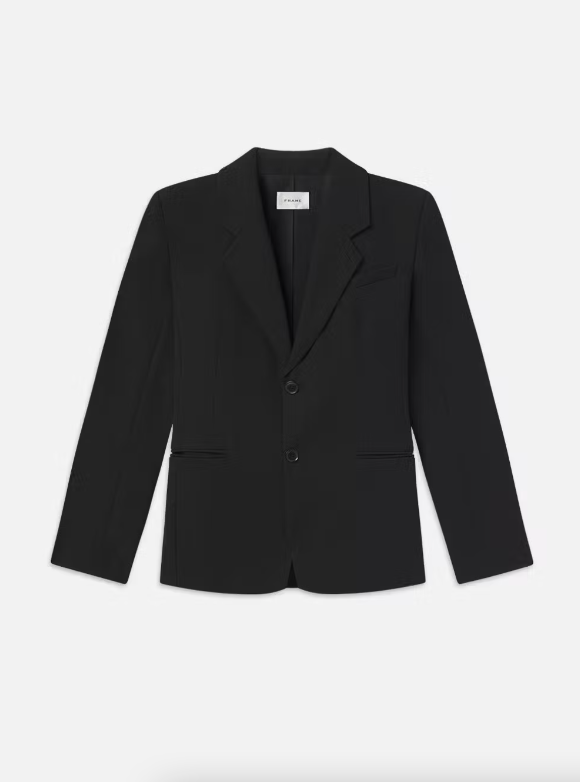 The Grandfather Blazer by Frame La Brands is a black, tailored blazer for women featuring a notched lapel and two buttons. This vintage-inspired piece has long sleeves and subtle horizontal seam details near the waist, exuding classic charm. The blazer is displayed against a white background.