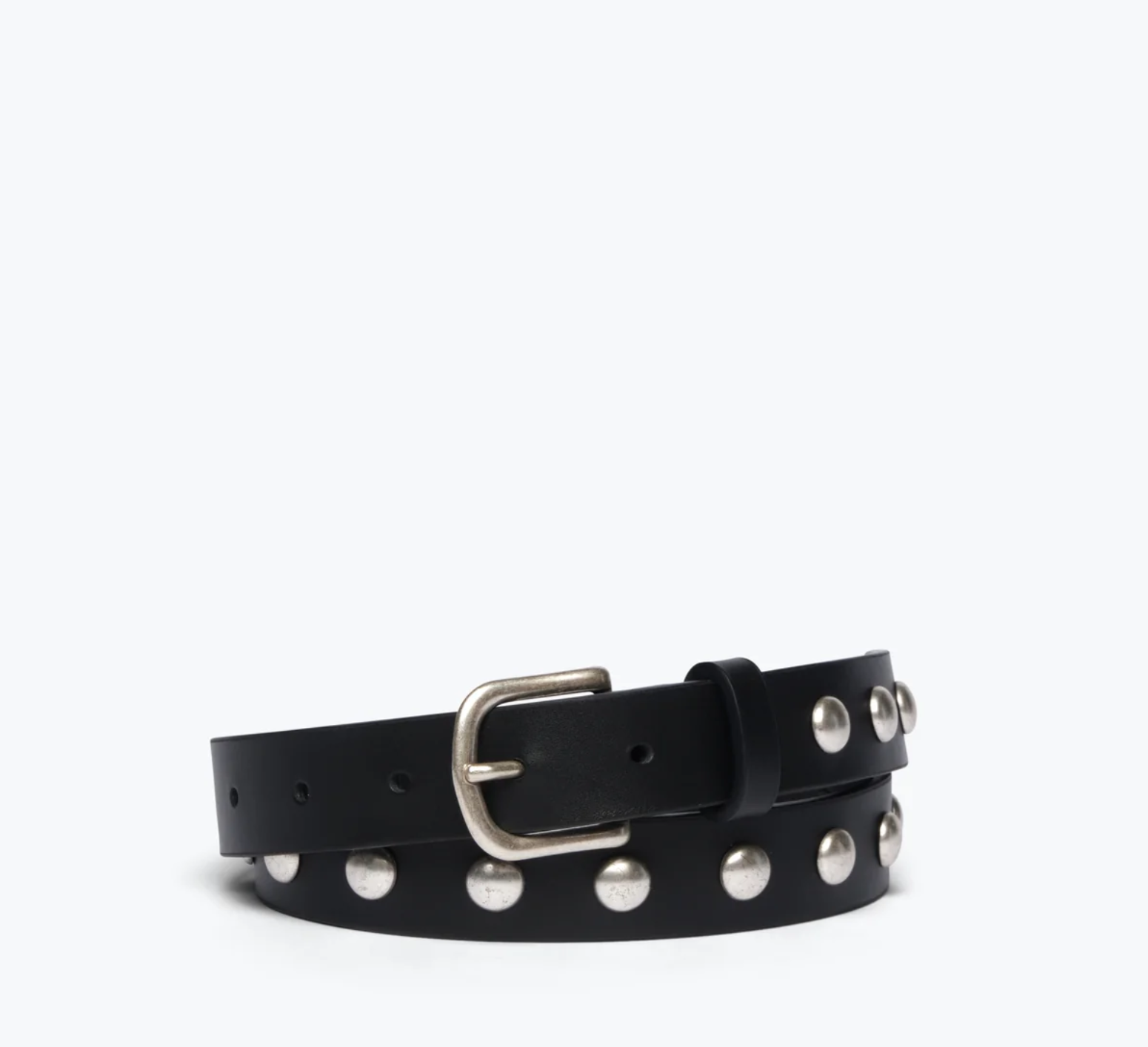 Introducing the Rebecca Black Calf Belt by Freda Salvador: A stylish and edgy accessory crafted from certified Spanish leather by the Leather Working Group. This black leather belt features a sleek silver buckle and two rows of evenly spaced, round silver Italian metal studs along its length, coiled in a chic loop.