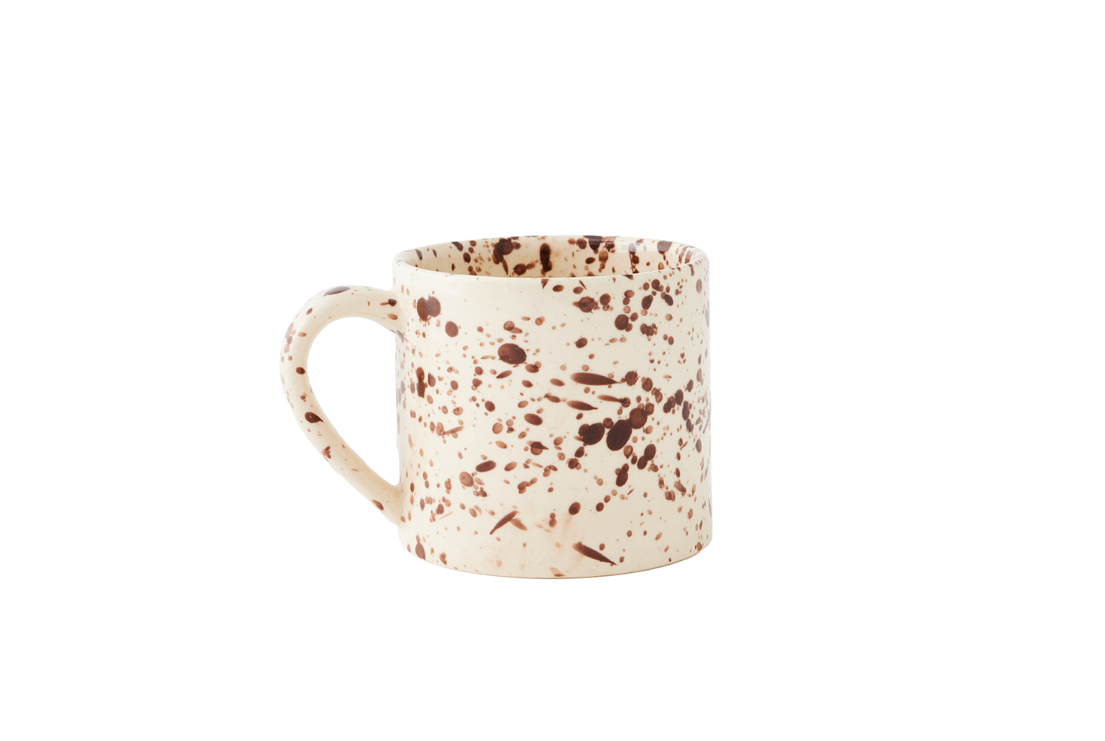 The Sir/Madam Splatterware Mug, a beige ceramic mug with a handle featuring an abstract pattern of brown speckles and splatters, is displayed against a white background. This piece of handmade ceramics, made in India, exemplifies exquisite craftsmanship.