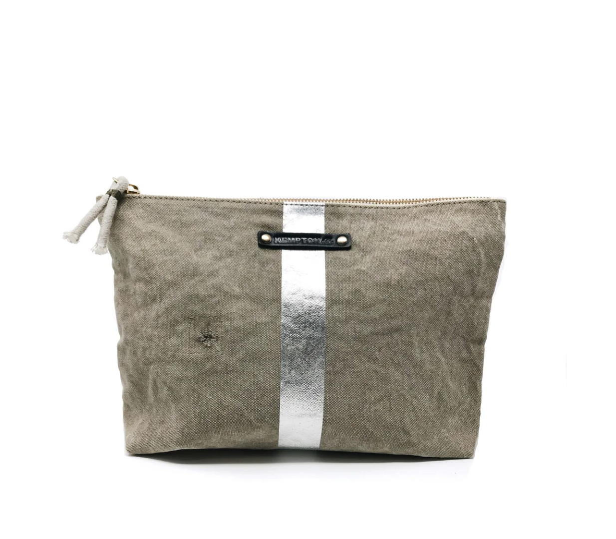 The Postal Silver Stripe Pouch by Kempton & Co. is a beige fabric pouch made from upcycled vintage textiles, featuring a silver stripe down the center. It has a zipper closure at the top with a small fabric pull, and includes a black label with silver text sewn near the top.