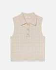 The Cable Knit Polo Vest by FRAME is a beige sleeveless knitted vest with cable stitchwork, textured pattern, collar, and a four-button front placket, ideal for achieving a monochrome look.