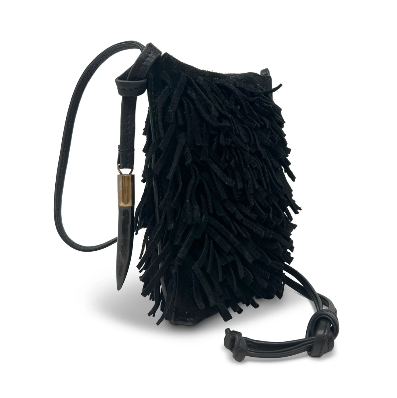 The Mini Sling Bag Black Suede Fringe by Kempton & Co. features a chic textured design with a jagged silhouette, crafted from suede leather fringe. It includes a long crossbody cord and is adorned with a stylish metal accent on the strap.