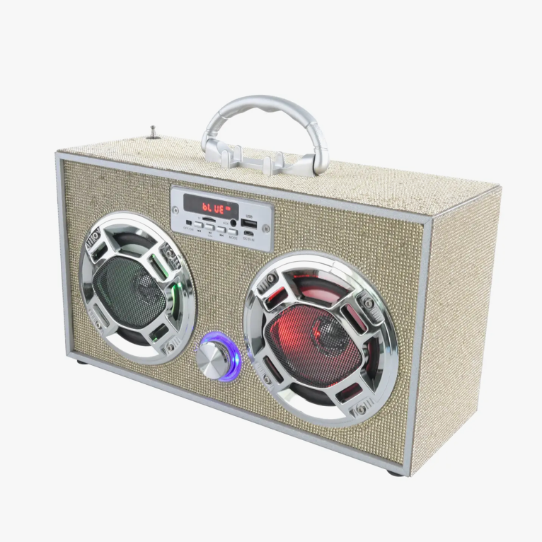 A Trend Tech Brands/wireless Gold Bling Wireless Boombox with Fm Radio, featuring Bluetooth connectivity, a beige textured exterior with two large circular speakers with metal grills, a central control panel with buttons and a display, multiple input options, and a handle on top for easy carrying. The boombox emits colorful LED lights.