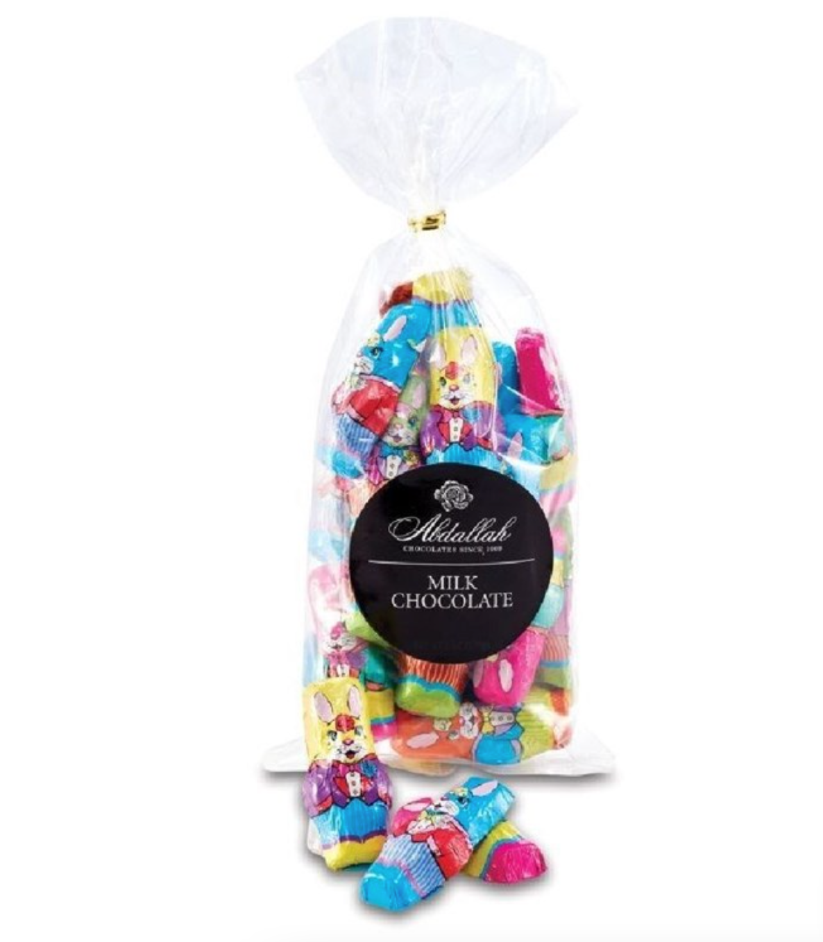 A clear bag contains milk chocolate rabbits wrapped in colorful foil, featuring an oval black label with white text: "Abdallah Chocolate & Coffee Shop, Milk Chocolate," echoing the delightful charm associated with Abdallah Candies.