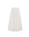 A white A-line Delia Maxi Skirt with a pleated elastic waistband, displayed against a plain background by Mikoh.