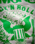 Close-up of a green and white Made Worn shrunken sweat featuring the phrase "MONSTERS OF ROCK 'N' ROLL" and an eagle motif surrounded by bungalows and stars.