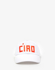 Clare Vivier's baseball hat features bold red embroidered letters that spell "CIAO" on a plain, light-colored background, complemented by an adjustable closure for a perfect fit.