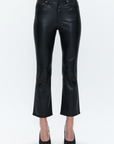 A person is wearing buttery soft, black, high-waisted Lennon Pants by Pistola with a slightly flared cut and black pointed-toe heels. The background is plain white, and only the lower half of the body is shown.