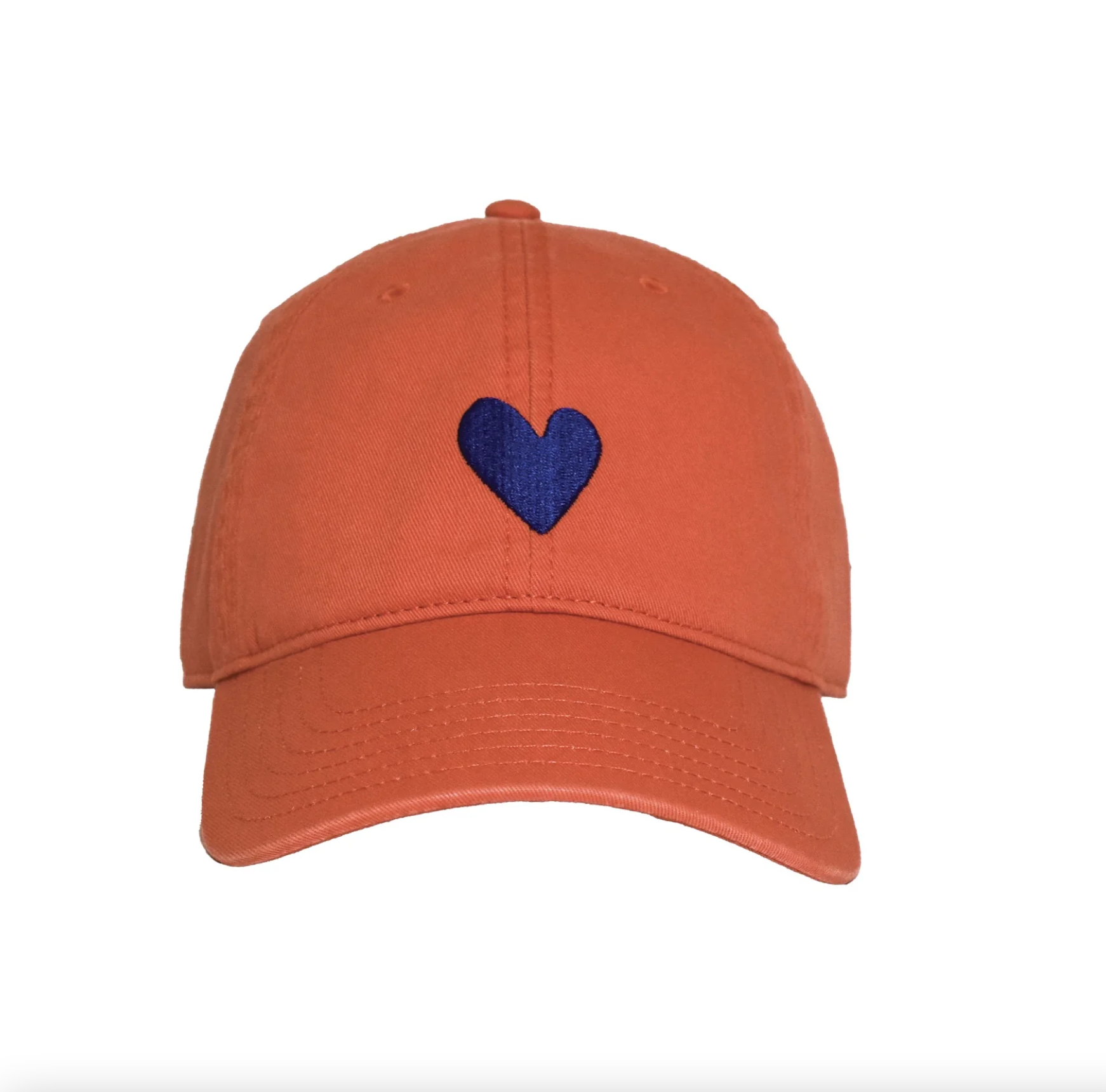 Introducing the Kerri Rosenthal Embroidered Heart Hat, featuring a blue heart embroidered on the front center. Part of the KR CAP-Sule Collection, this orange baseball cap is made from 100% cotton and includes a curved brim with visible stitching lines, set against a plain white background.