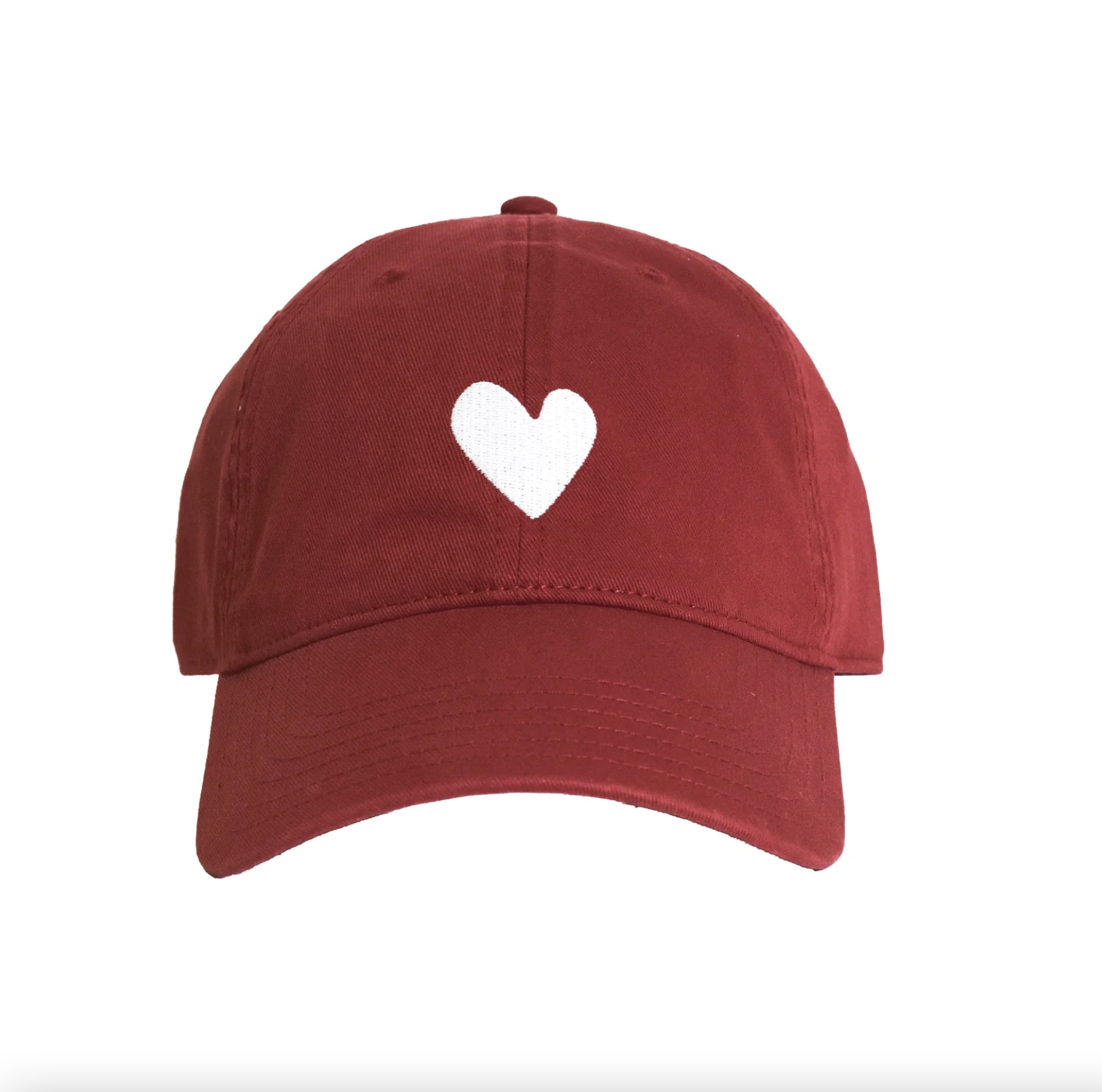 A maroon Embroidered Heart Hat by Kerri Rosenthal, featuring a simple white heart symbol on the front center from the KR CAP-Sule Collection, is positioned against a plain white background.