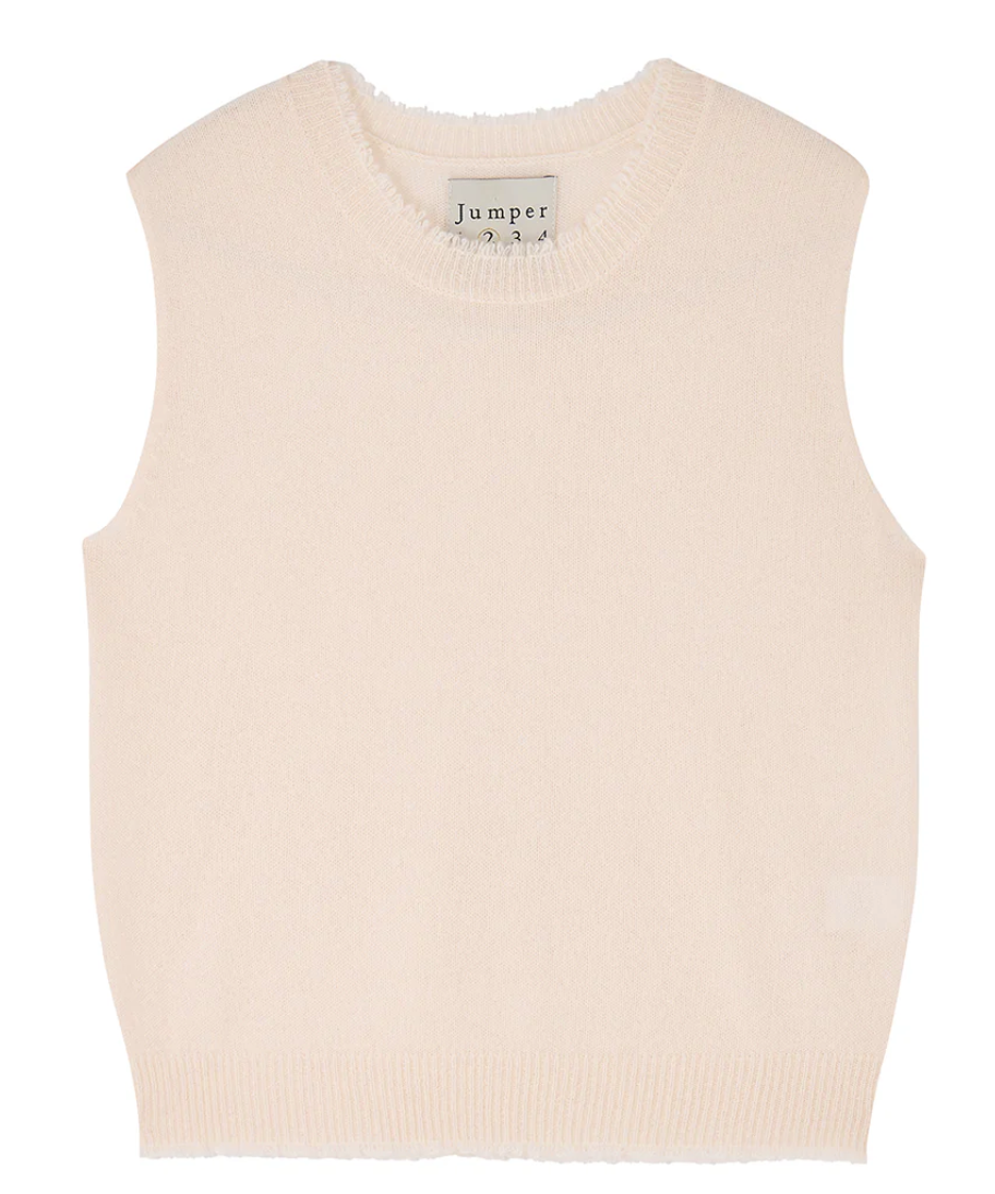 A cream-colored sleeveless cashmere jumper from Jumper 1 2 3 4/CR2, named "Distressed Tank," features a round neckline and ribbed edges, as part of our core collection.